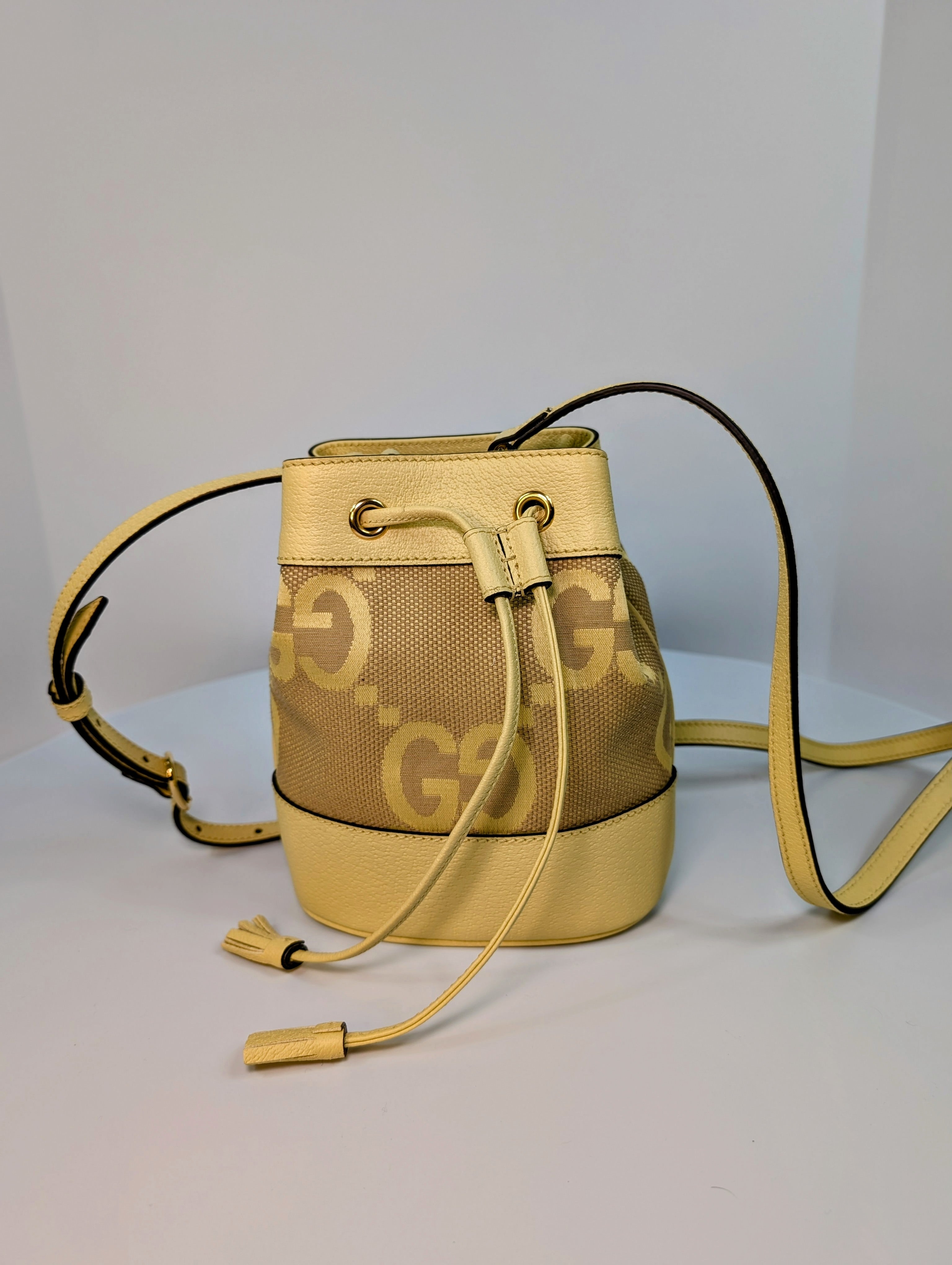 Gucci Yellow Mini Jumbo GG Bucket Bag and Lilac Wallet