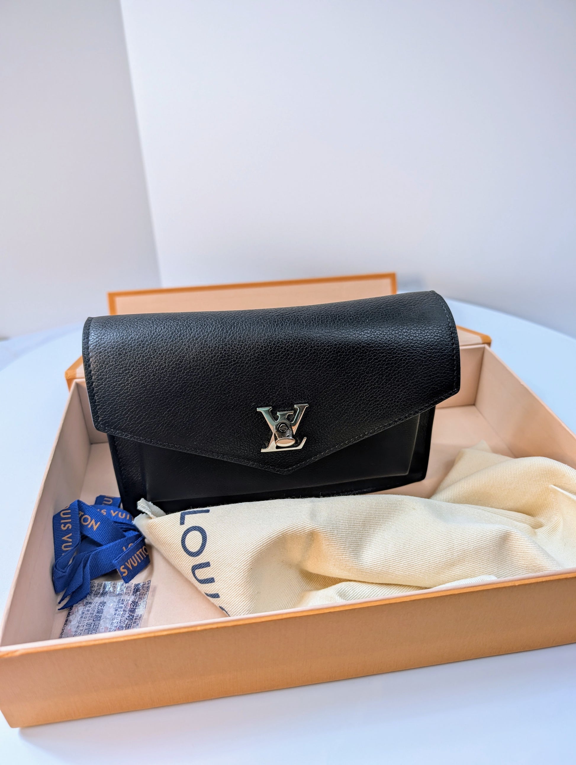 Louis Vuitton Black Grained Leather Twist Wallet on Chain (WOC)
