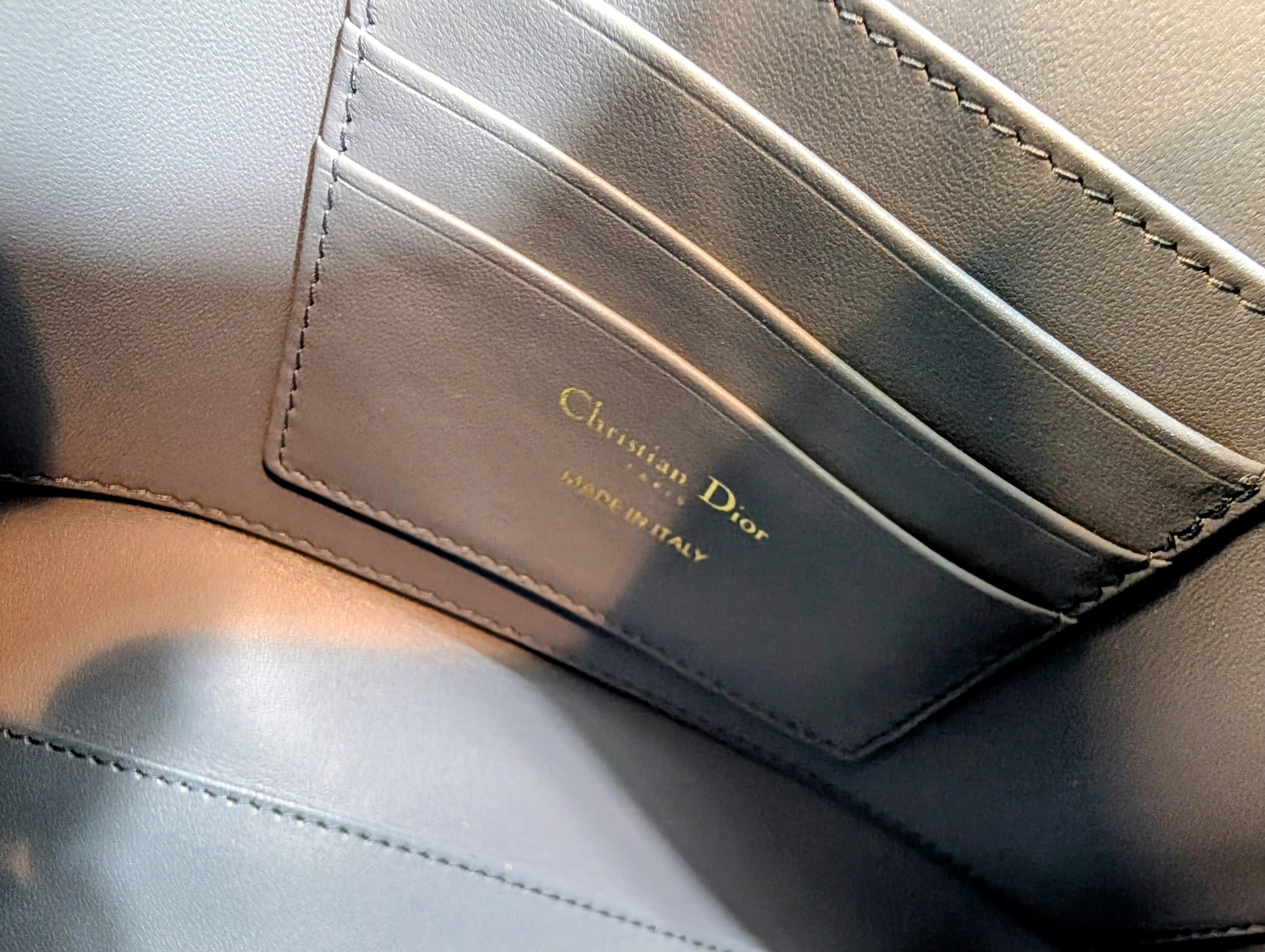Christian Dior Raffia Cannage Caro Zipped Wristlet