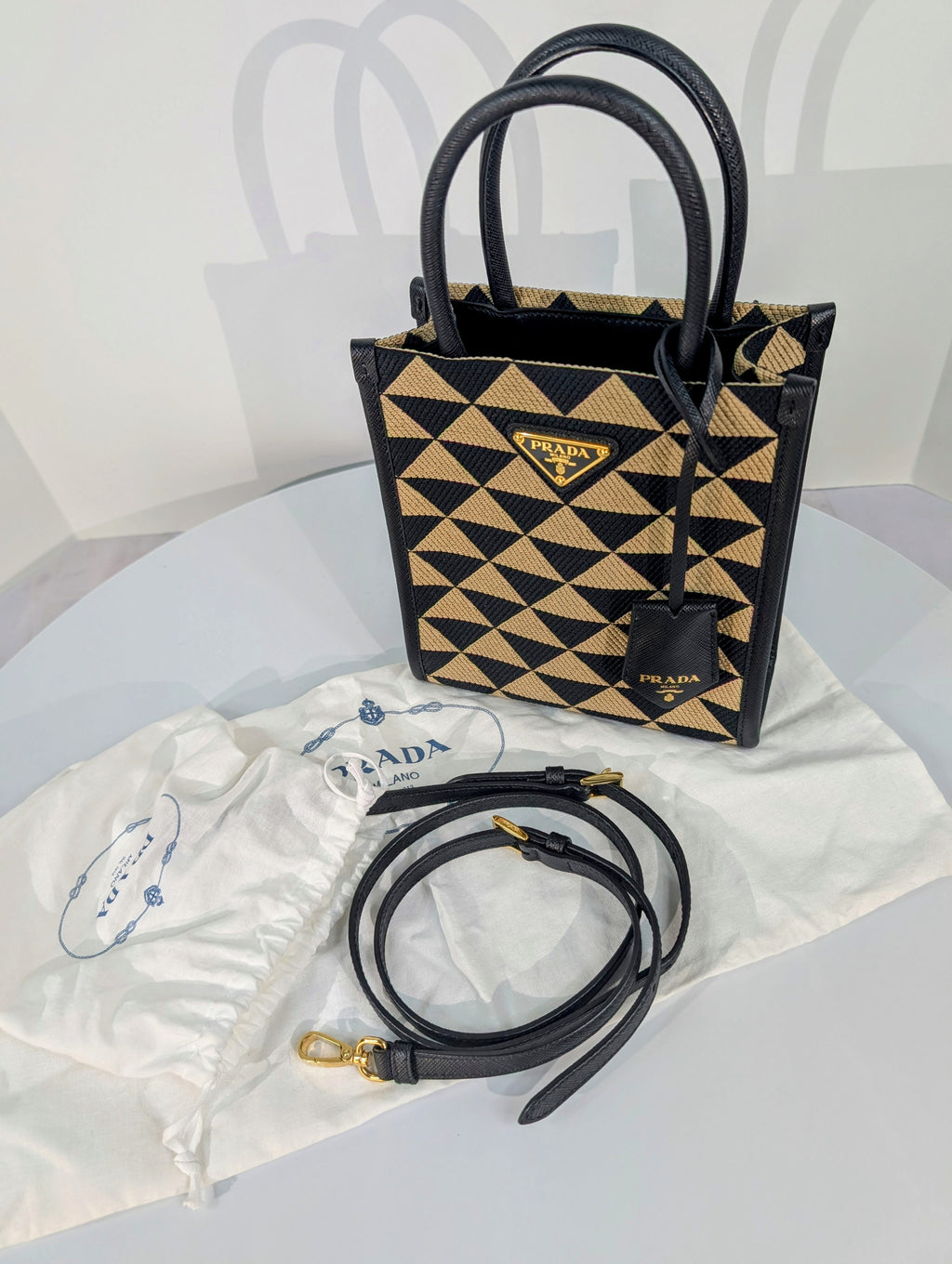 Prada Small Woven Triangle Tote Bag in Black and Beige