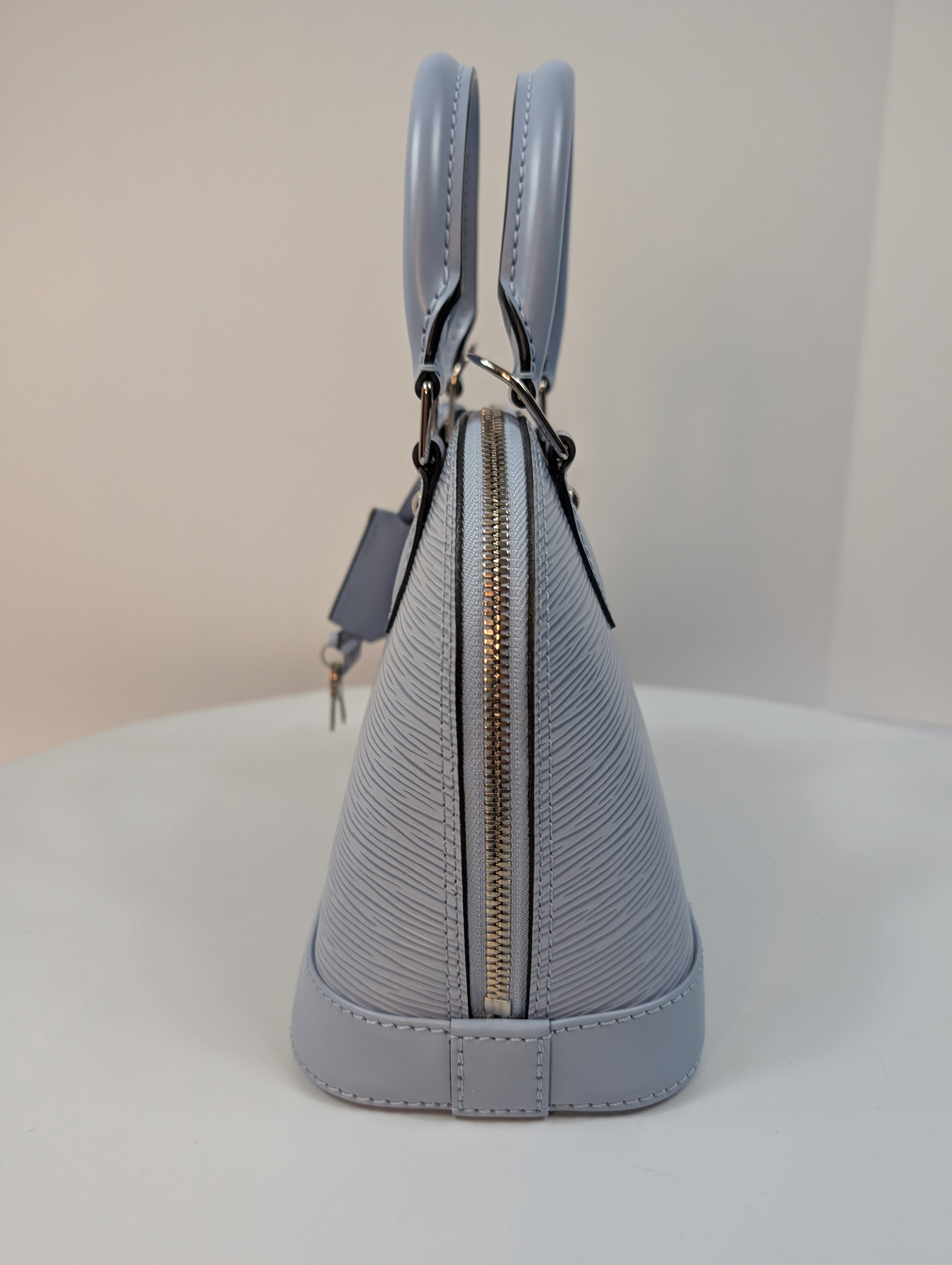 Louis Vuitton Alma BB Handbag in Blue Epi Leather with LV Strap