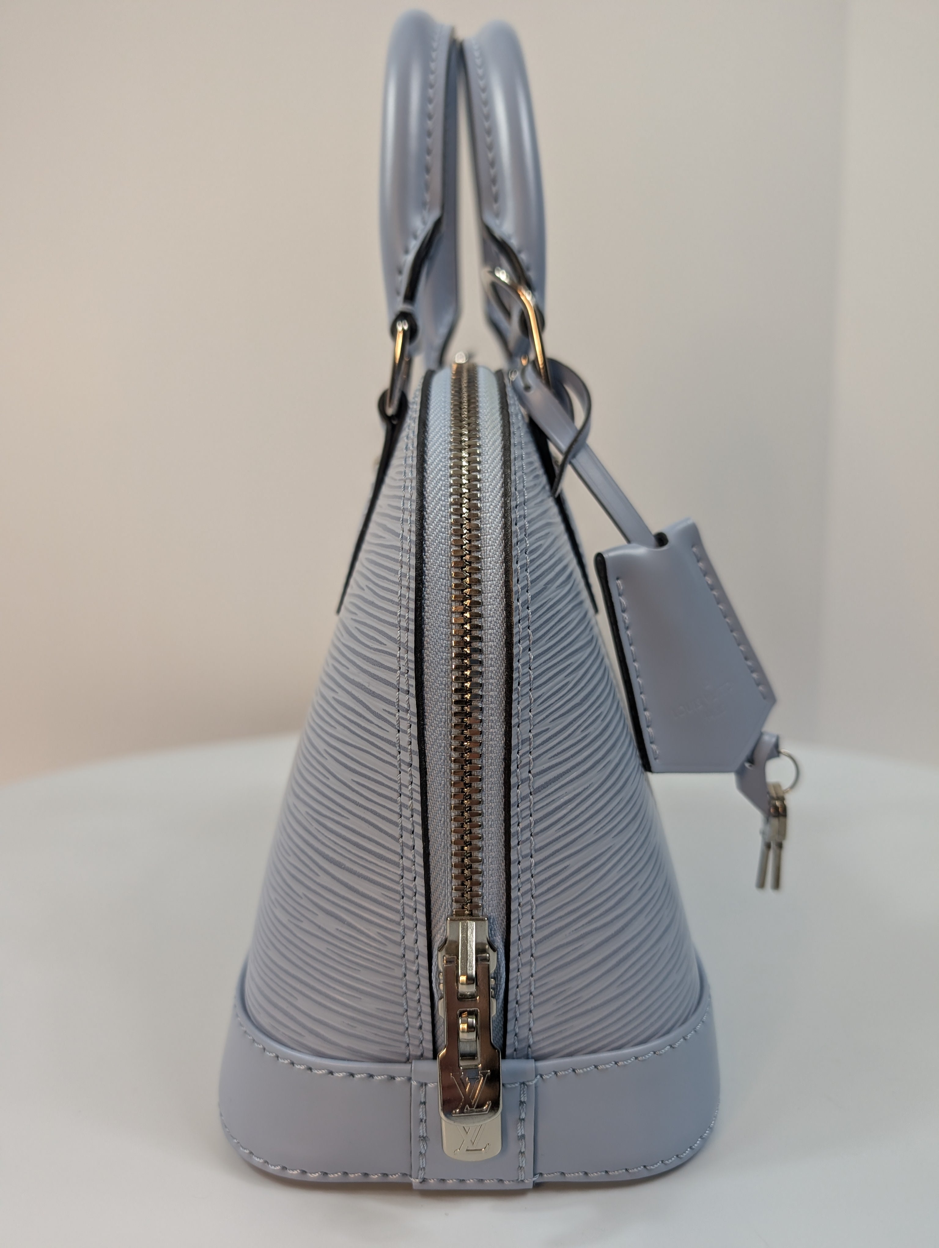 Louis Vuitton Alma BB Handbag in Blue Epi Leather with LV Strap