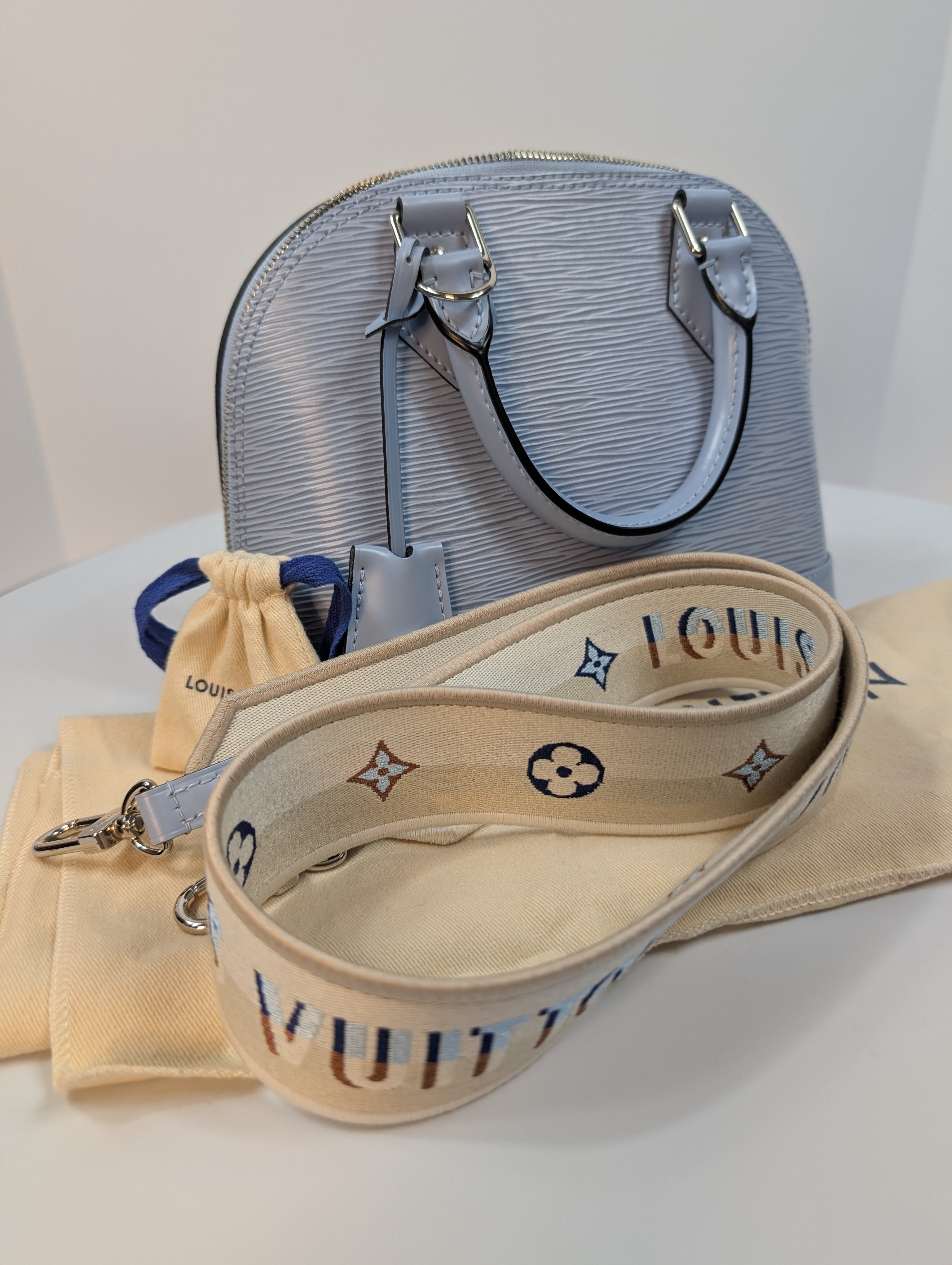 Louis Vuitton Alma BB Handbag in Blue Epi Leather with LV Strap