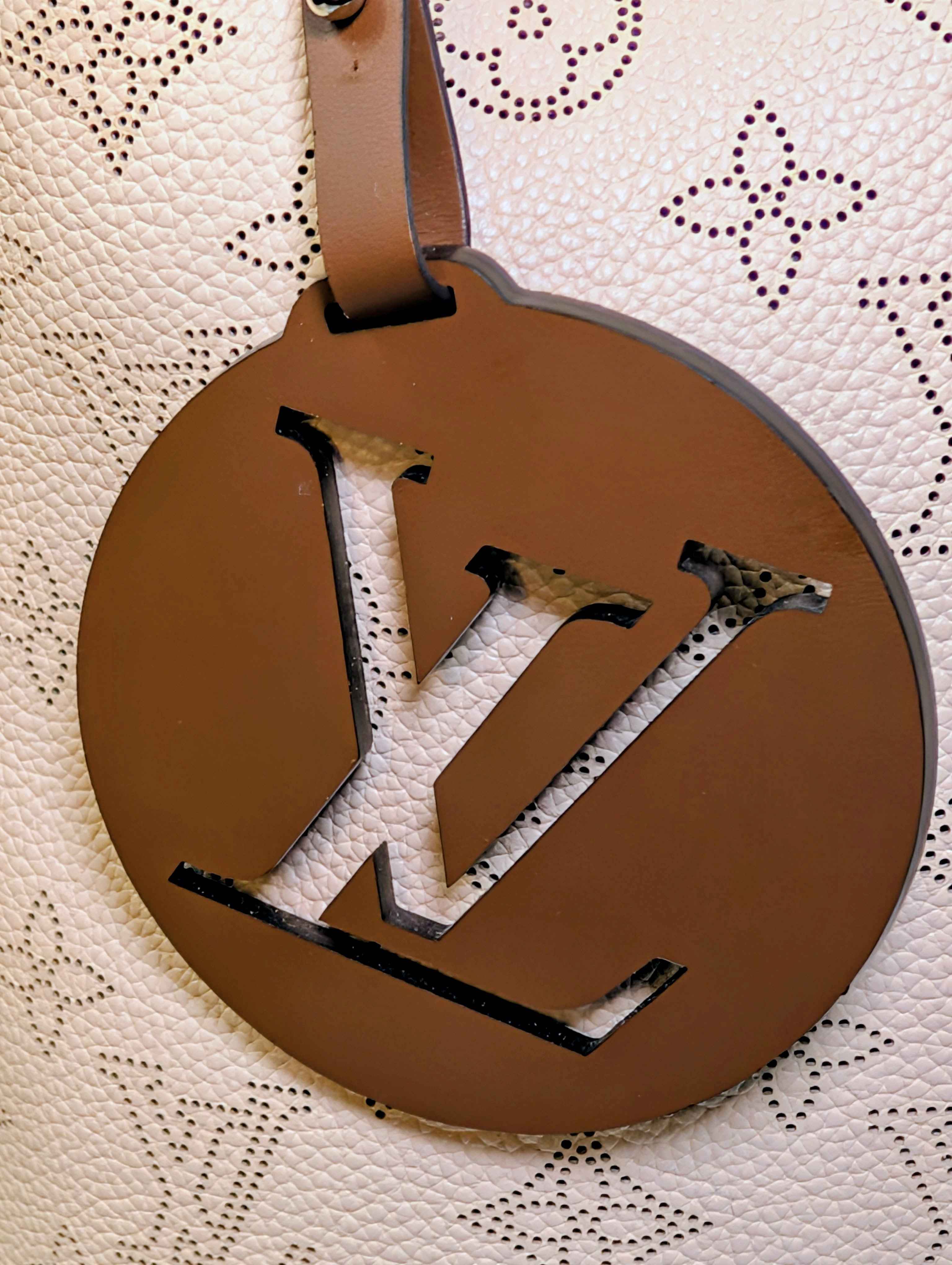 Louis Vuitton Cream Perforated Leather Mahina Babylon GM Hobo Bag