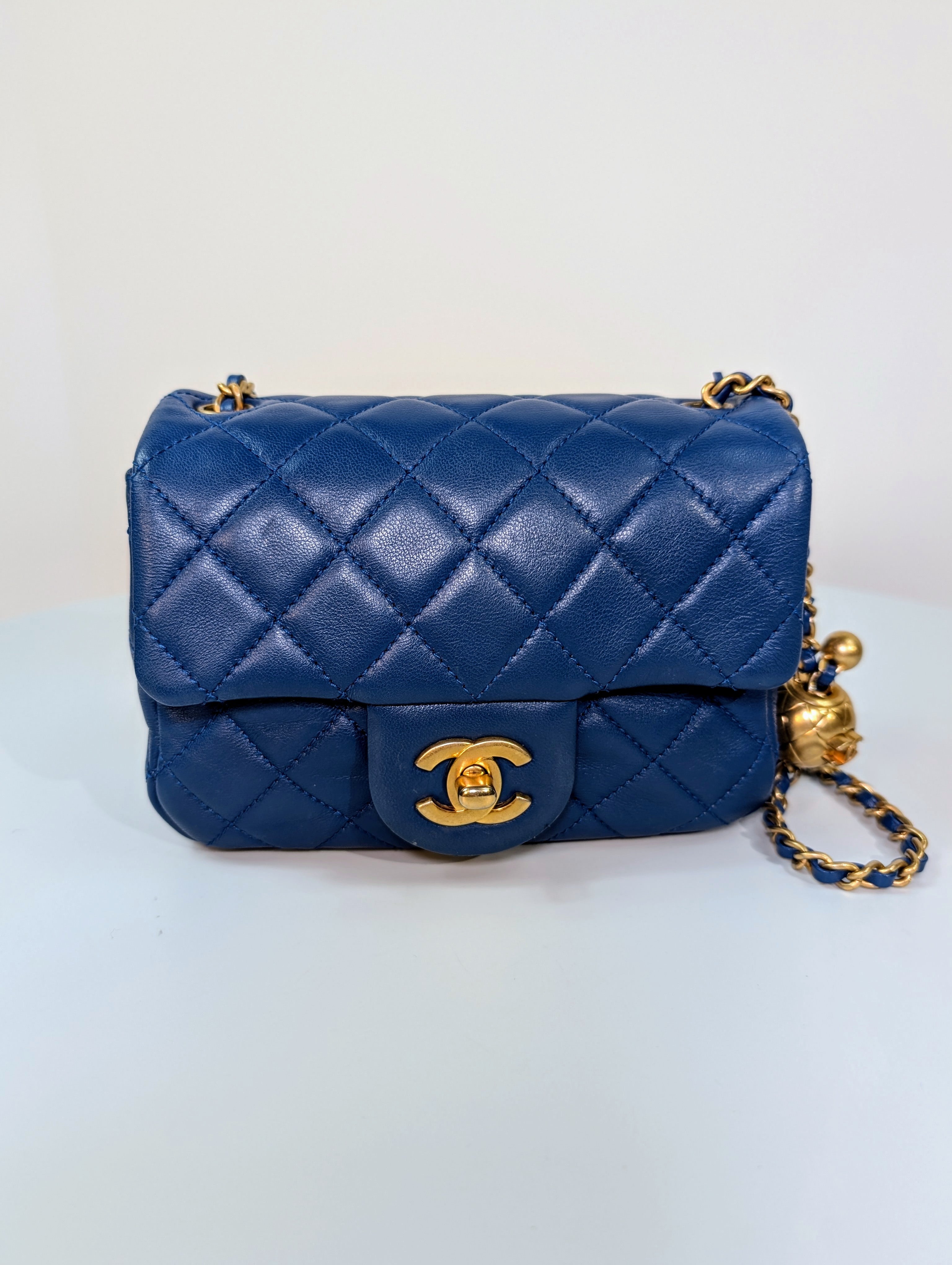 Chanel Blue Quilted Lambskin Round Charm Mini Flap Bag