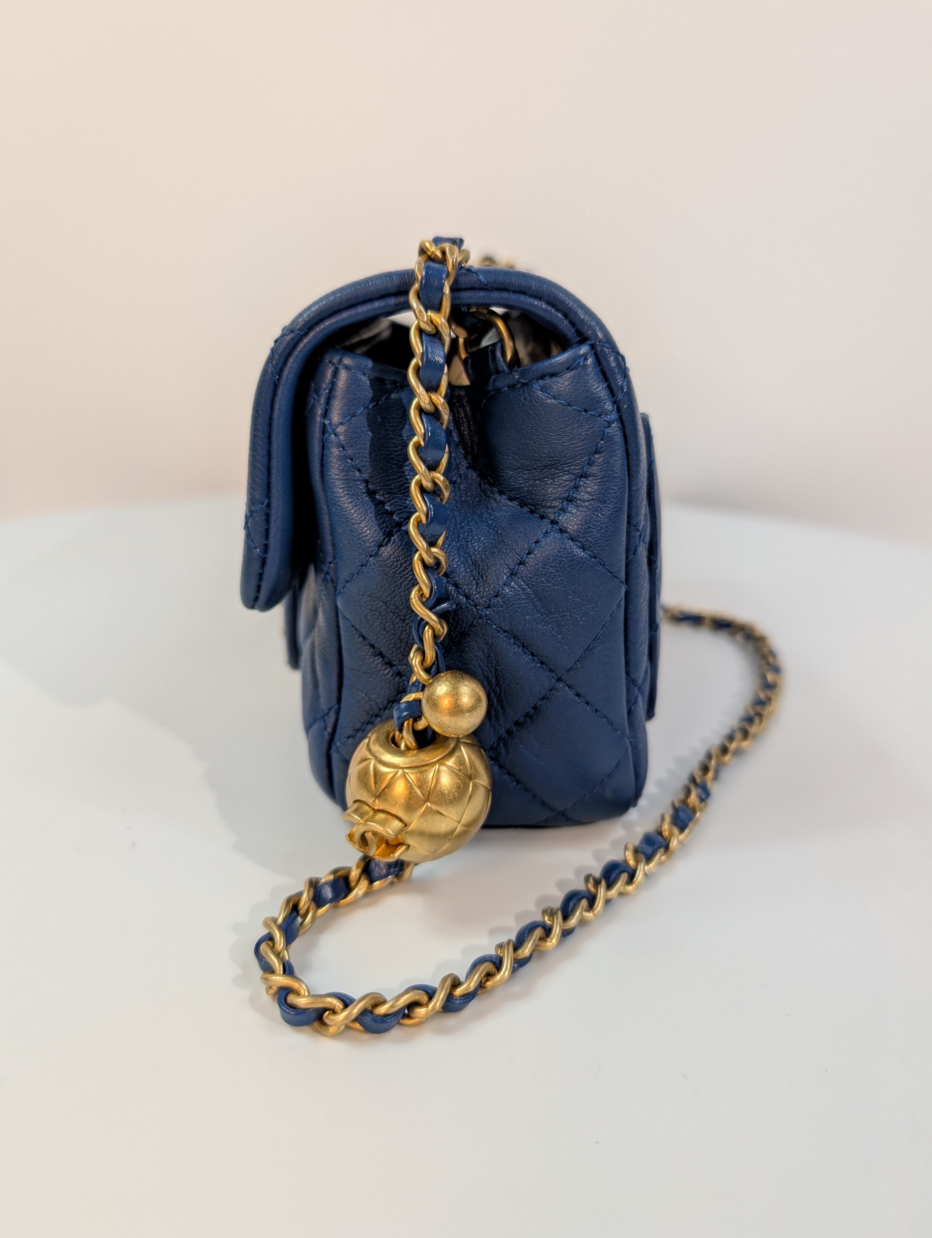 Chanel Blue Quilted Lambskin Round Charm Mini Flap Bag
