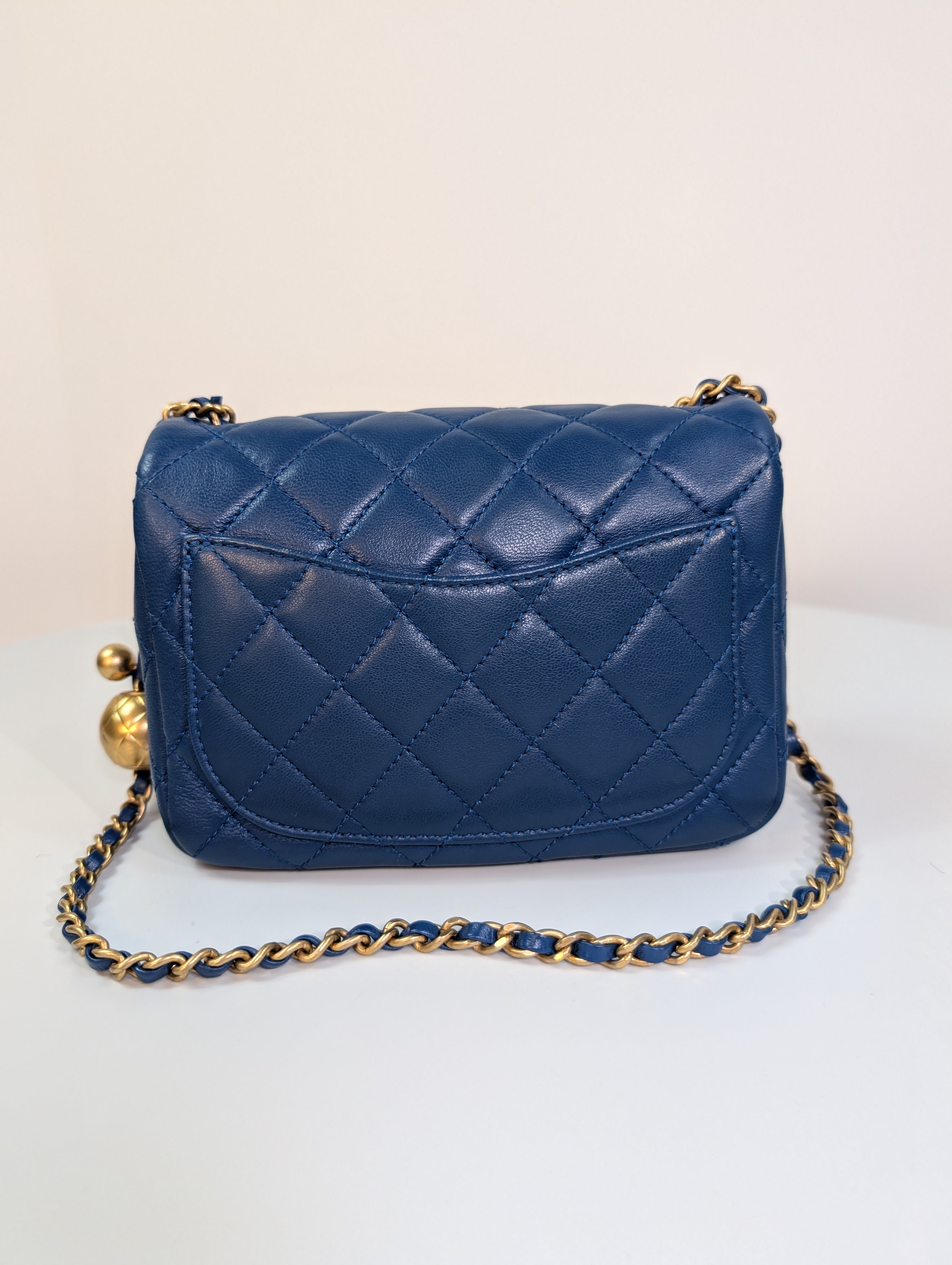 Chanel Blue Quilted Lambskin Round Charm Mini Flap Bag
