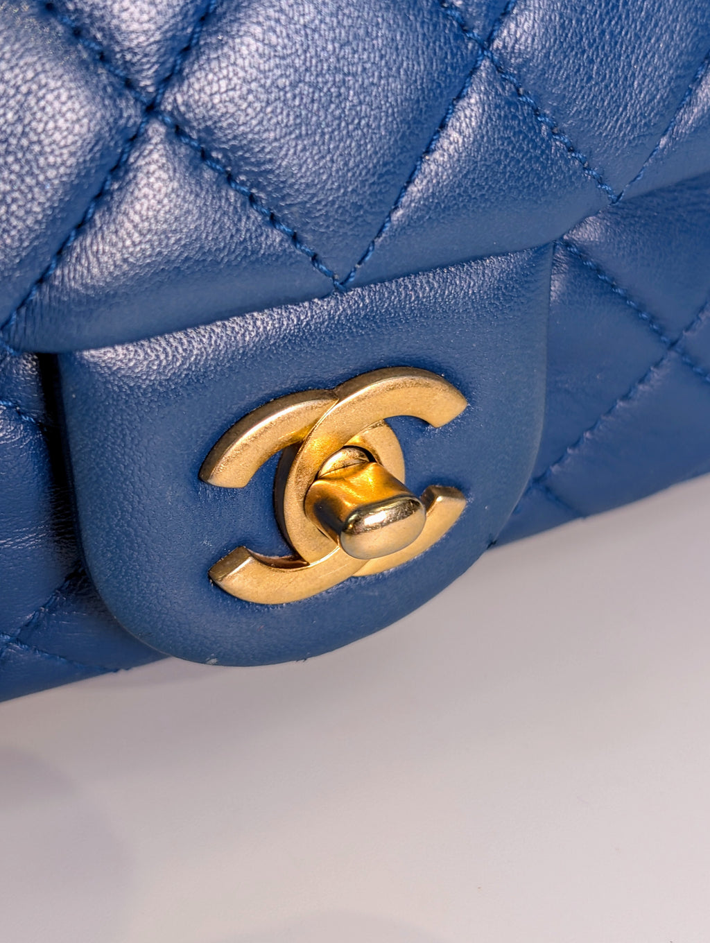 Chanel Blue Quilted Lambskin Round Charm Mini Flap Bag