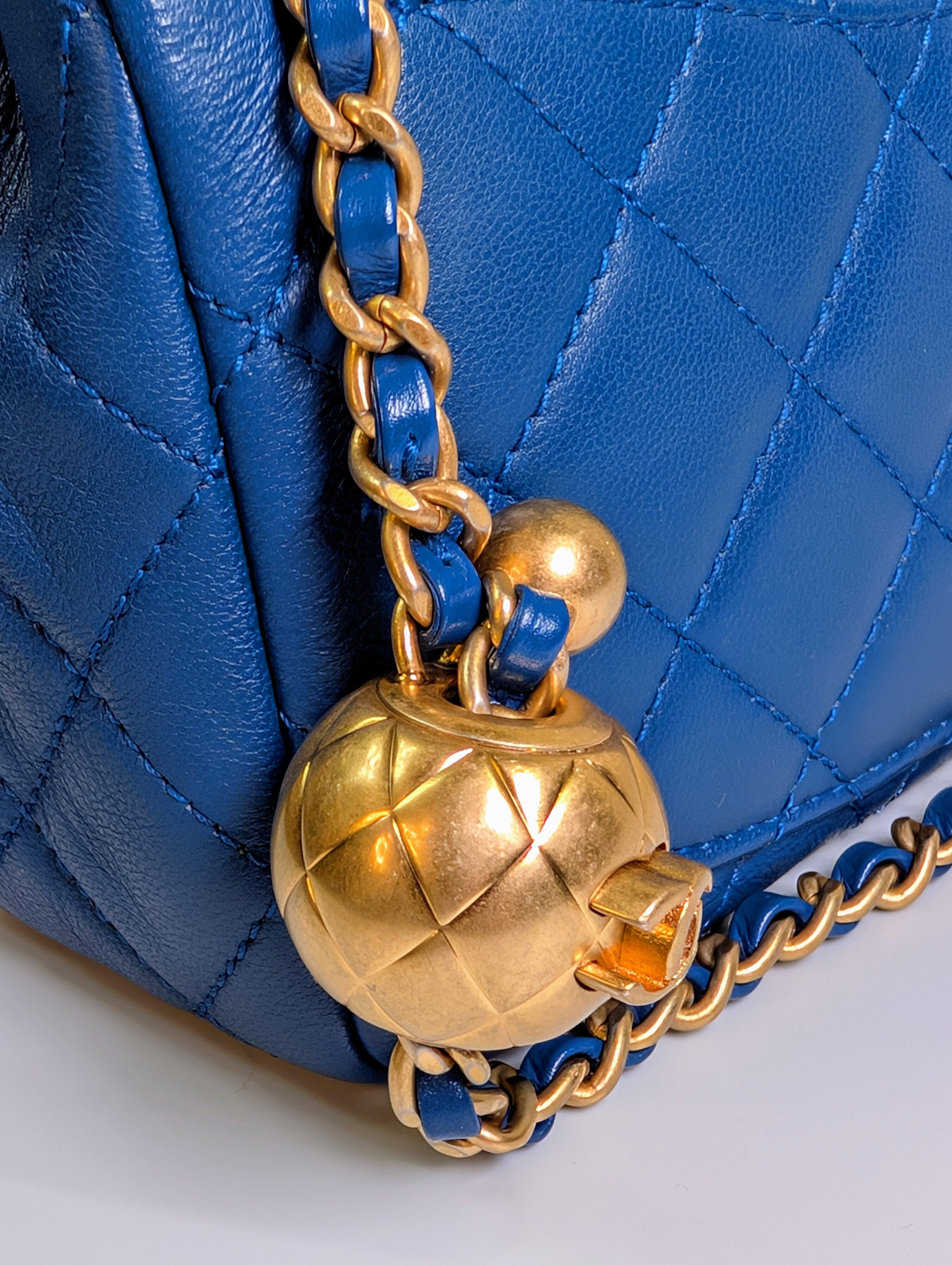 Chanel Blue Quilted Lambskin Round Charm Mini Flap Bag