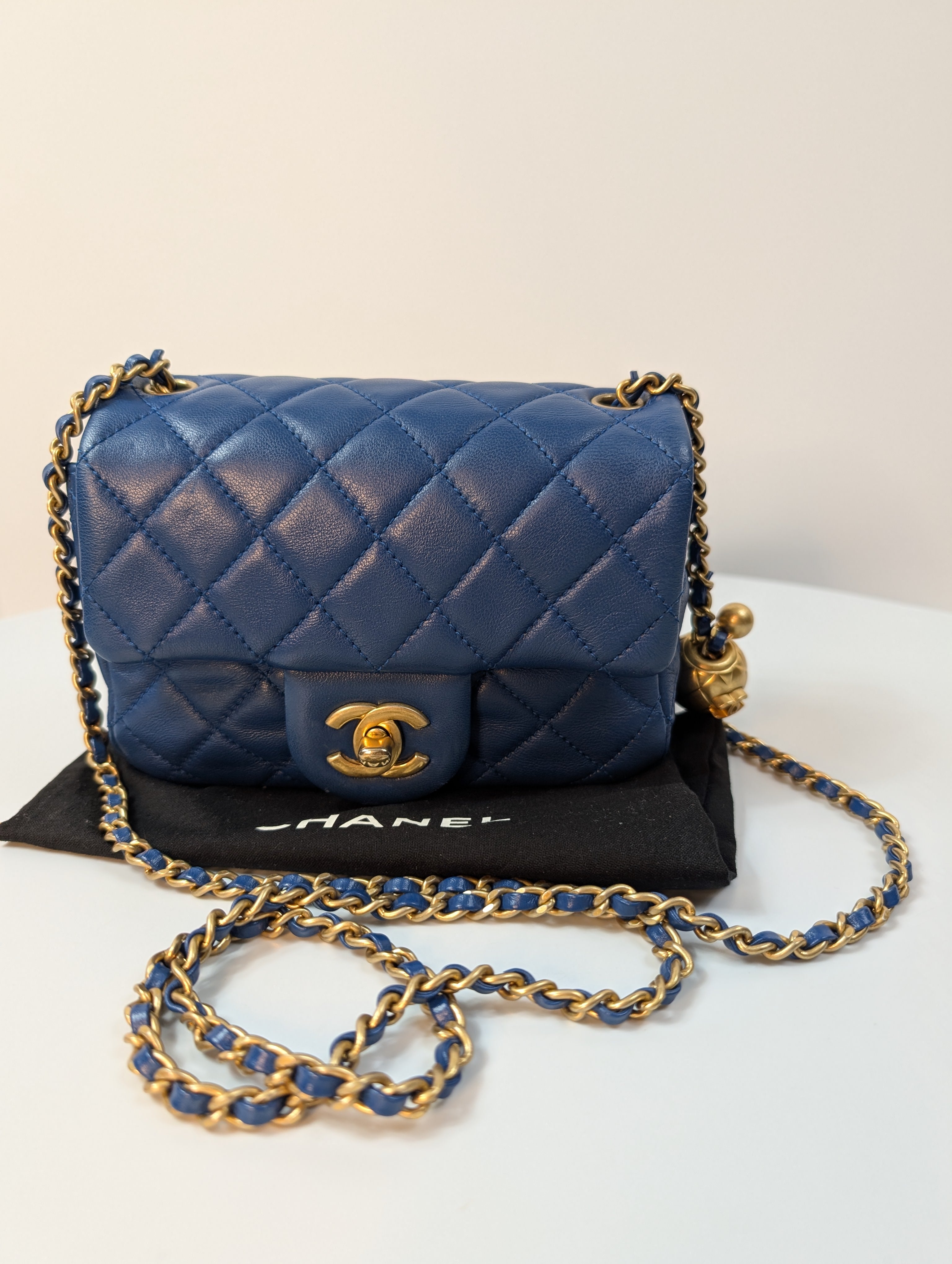 Chanel Blue Quilted Lambskin Round Charm Mini Flap Bag