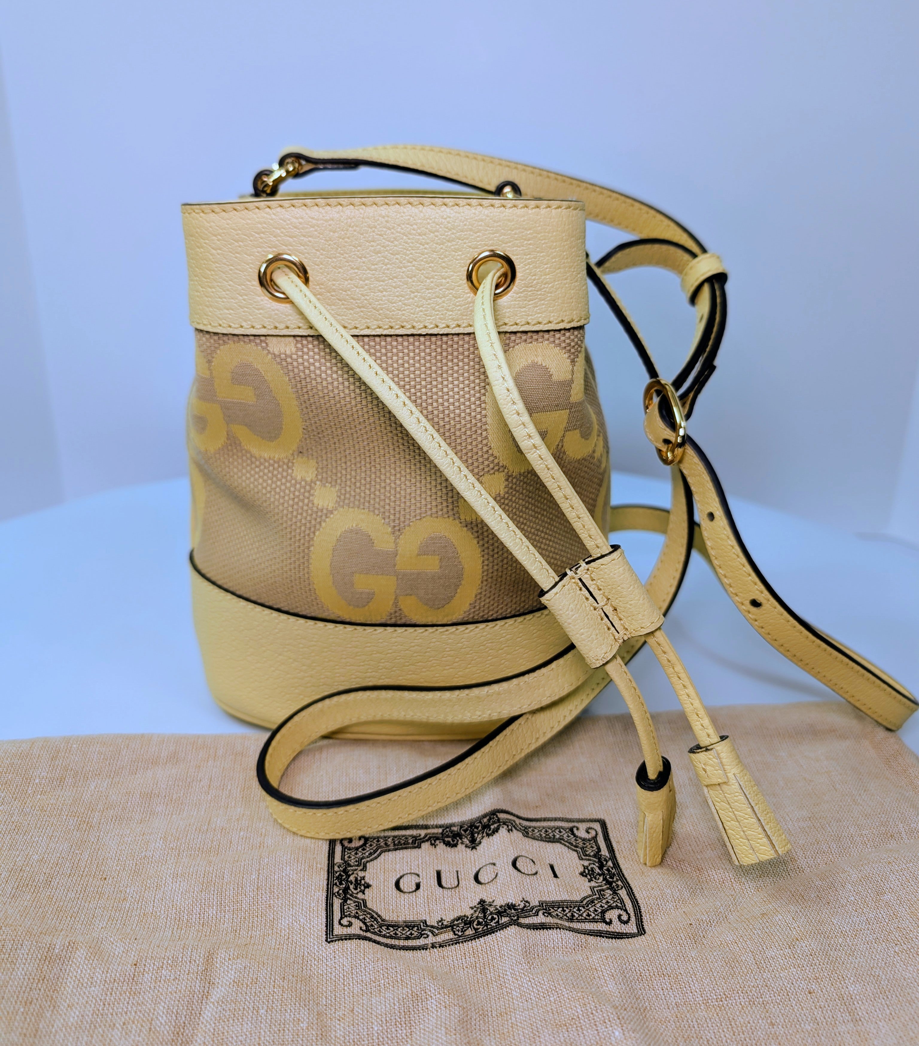 Gucci Yellow Mini Jumbo GG Bucket Bag and Lilac Wallet