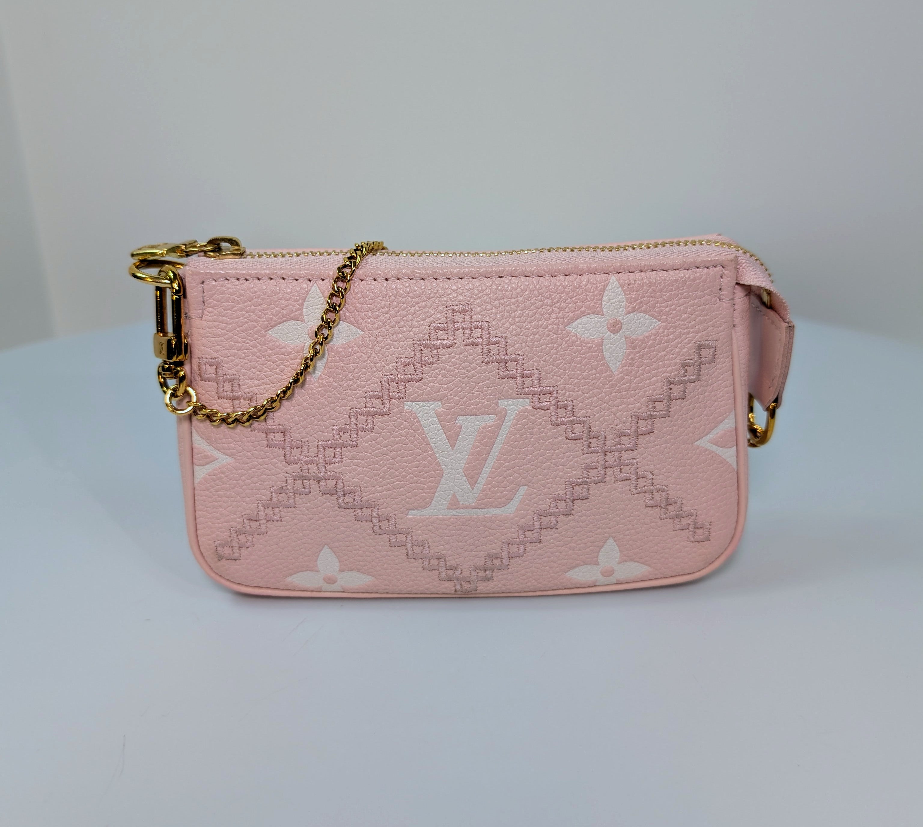 Louis Vuitton Pink Monogram Empreinte Mini Pochette Accessories Bag