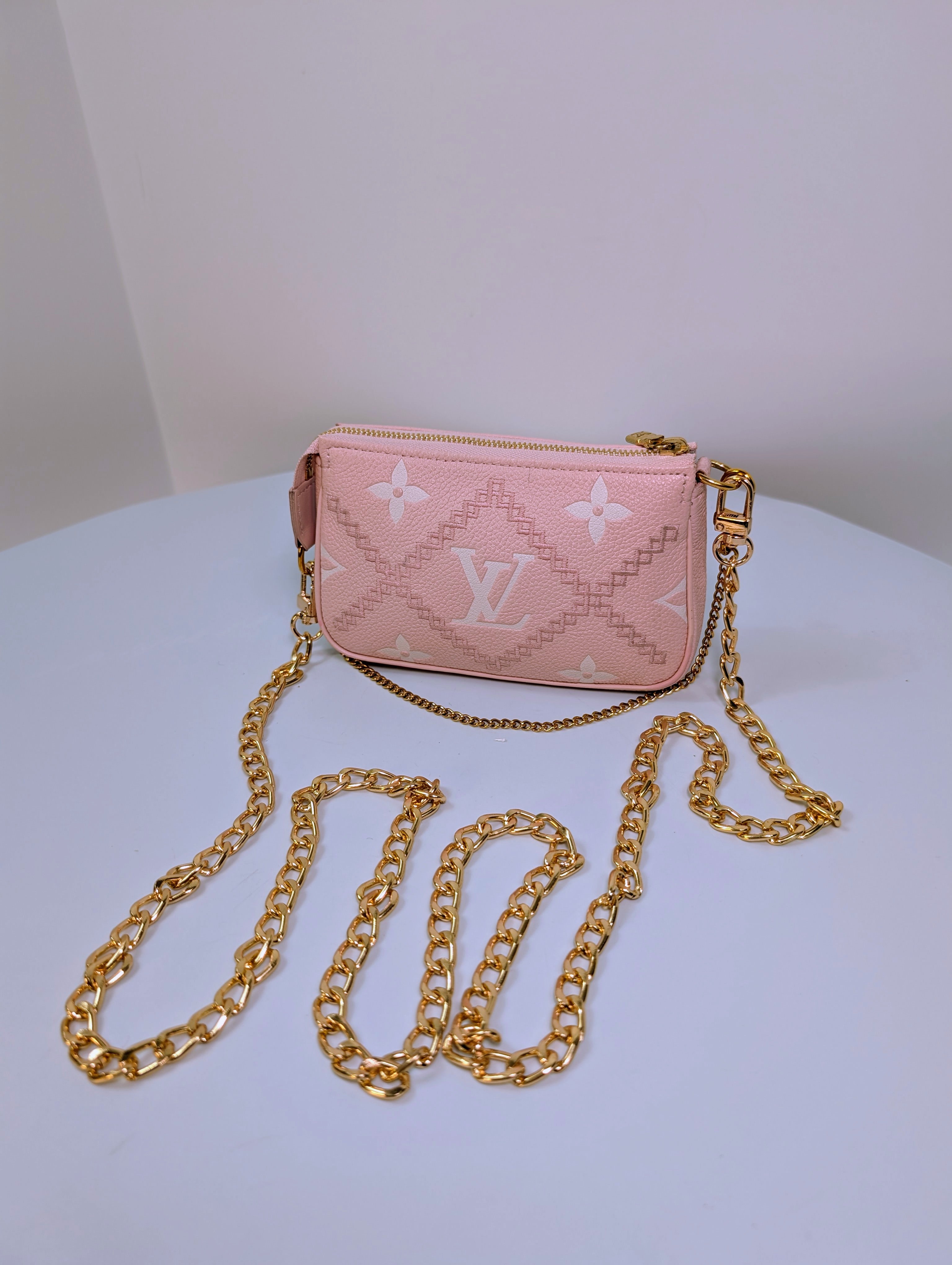 Louis Vuitton Pink Monogram Empreinte Mini Pochette Accessories Bag