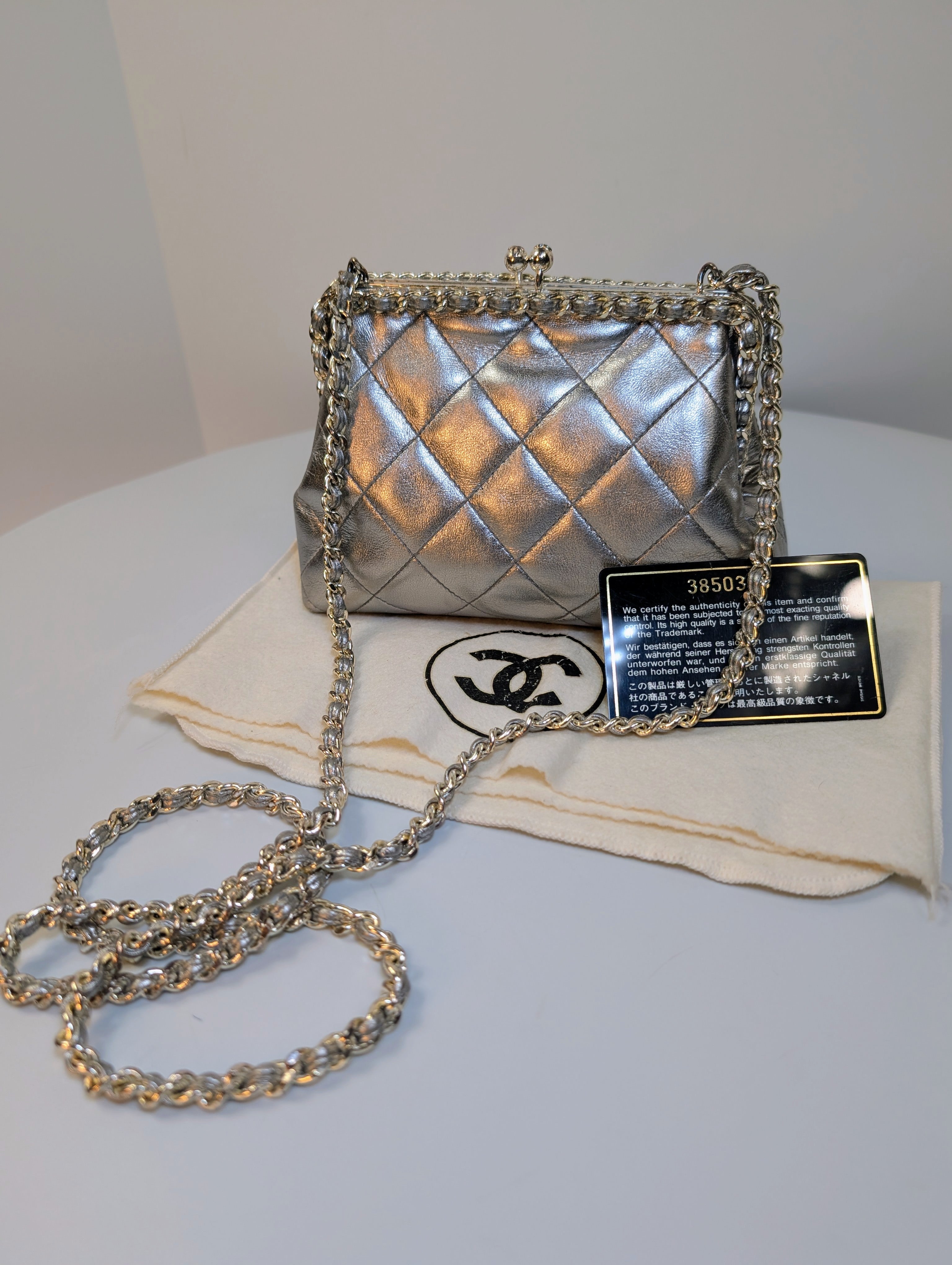 Chanel Vintage Metallic Silver Quilted Lambskin Kisslock Frame Bag (Mini Clutch)