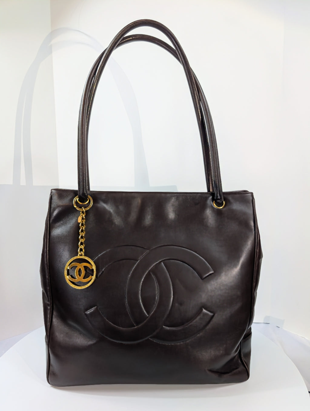 Chanel Vintage Dark Brown Chestnut Lambskin Stitched CC Tote with 24k Gold-Plated Charm