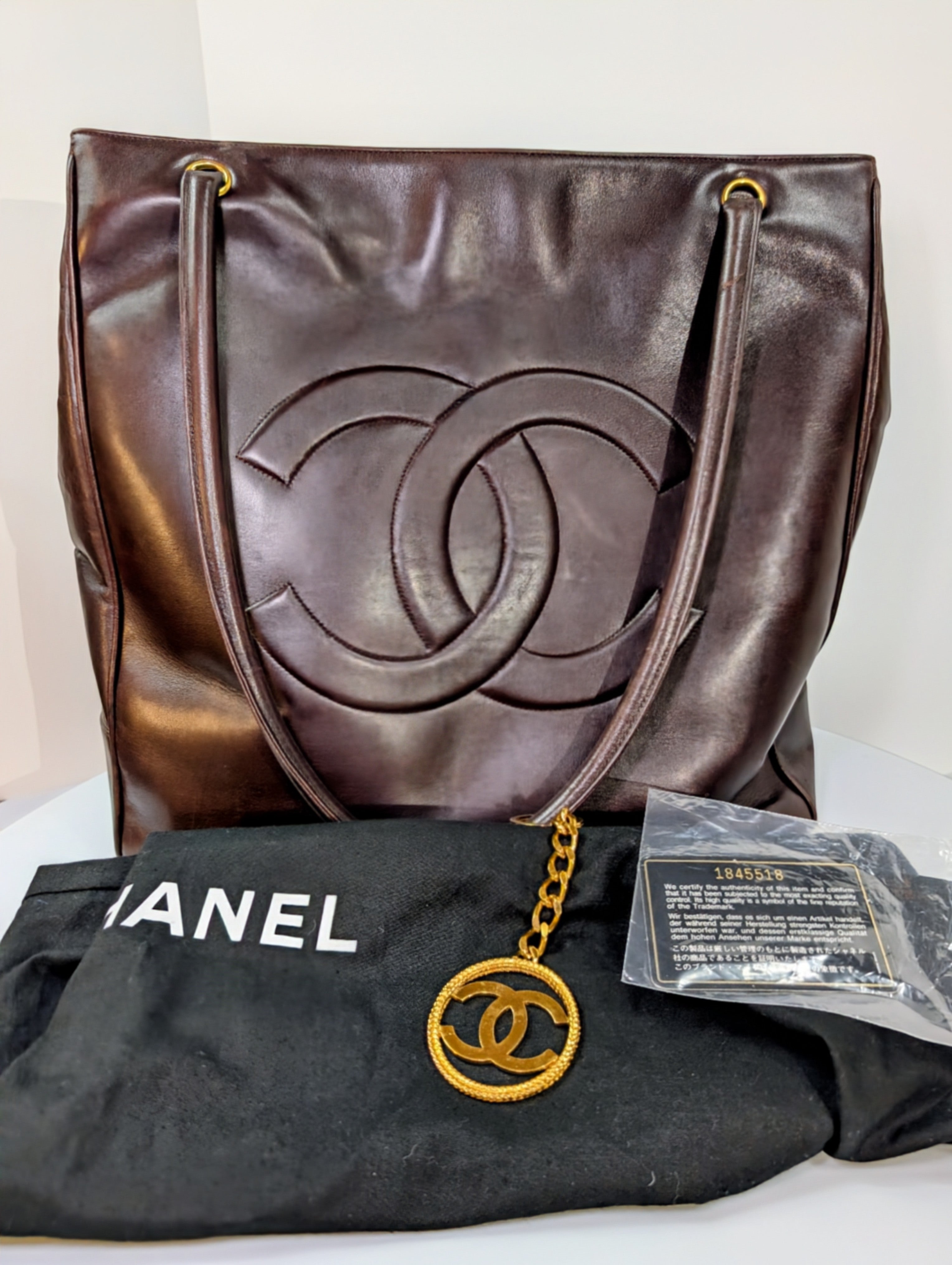 Chanel Vintage Dark Brown Chestnut Lambskin Stitched CC Tote with 24k Gold-Plated Charm