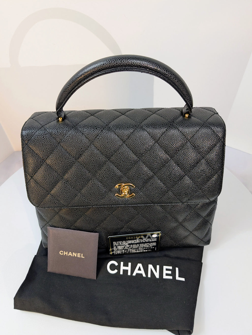 Chanel Vintage Black Quilted Caviar Leather Medium Kelly Flap Top Handle Bag