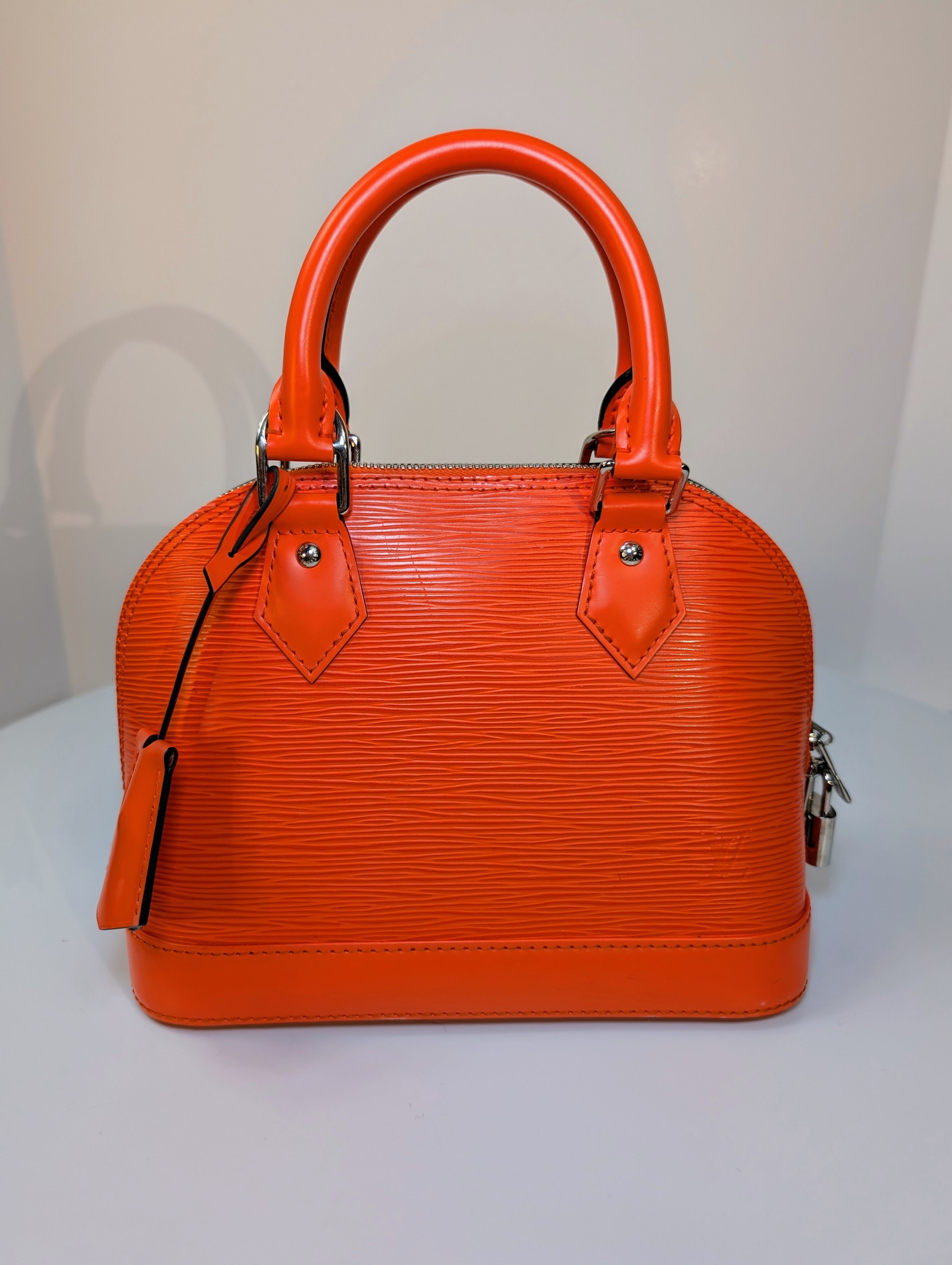Louis Vuitton Mandarin Orange Epi Leather Alma BB with Jacquard Strap and Lock