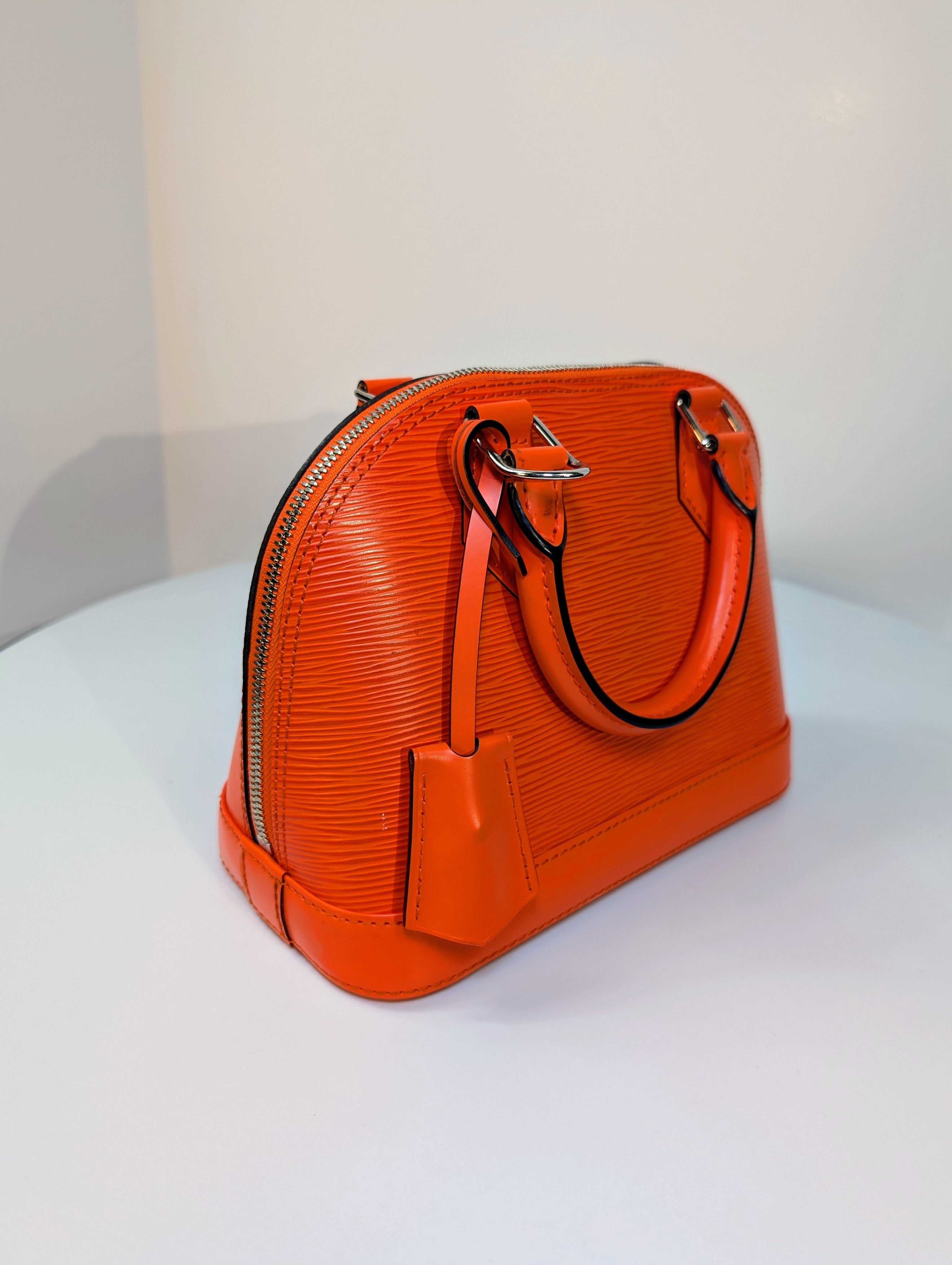 Louis Vuitton Mandarin Orange Epi Leather Alma BB with Jacquard Strap and Lock