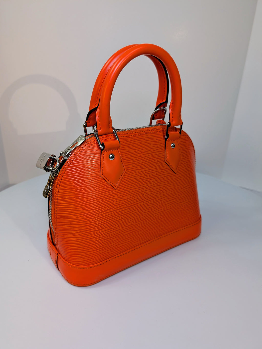 Louis Vuitton Mandarin Orange Epi Leather Alma BB with Jacquard Strap and Lock