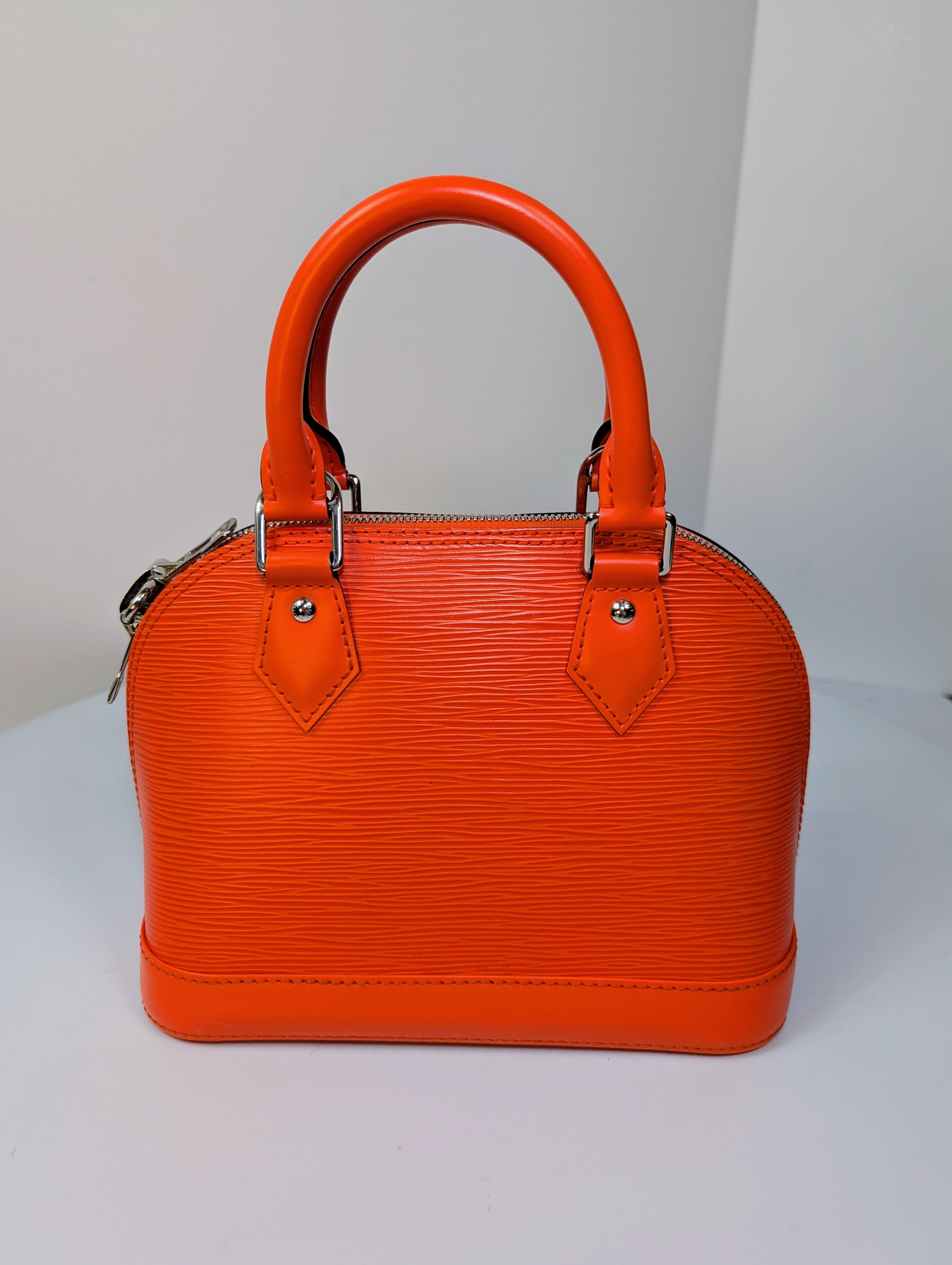 Louis Vuitton Mandarin Orange Epi Leather Alma BB with Jacquard Strap and Lock