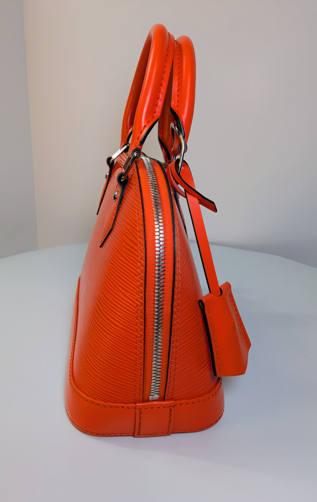 Louis Vuitton Mandarin Orange Epi Leather Alma BB with Jacquard Strap and Lock