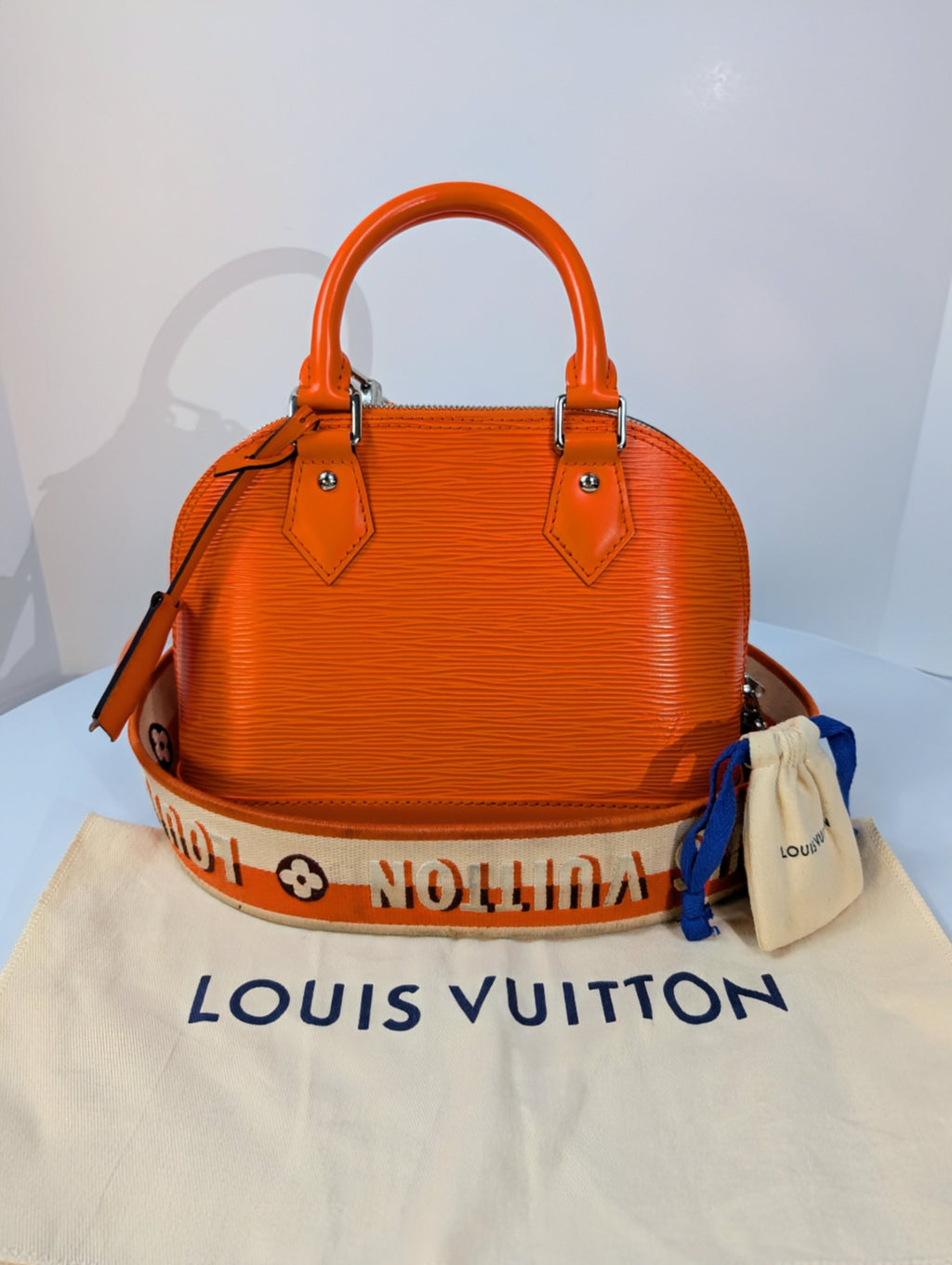 Louis Vuitton Mandarin Orange Epi Leather Alma BB with Jacquard Strap and Lock