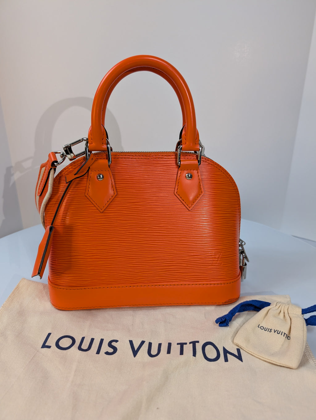 Louis Vuitton Mandarin Orange Epi Leather Alma BB with Jacquard Strap and Lock
