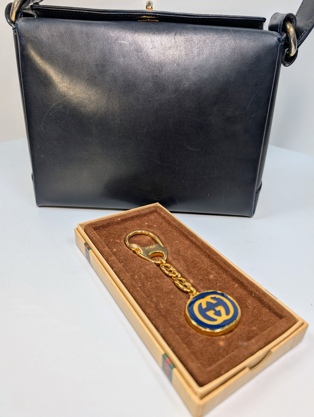 Gucci Vintage Gold Tone GG Logo Embossed Circle Bag Charm