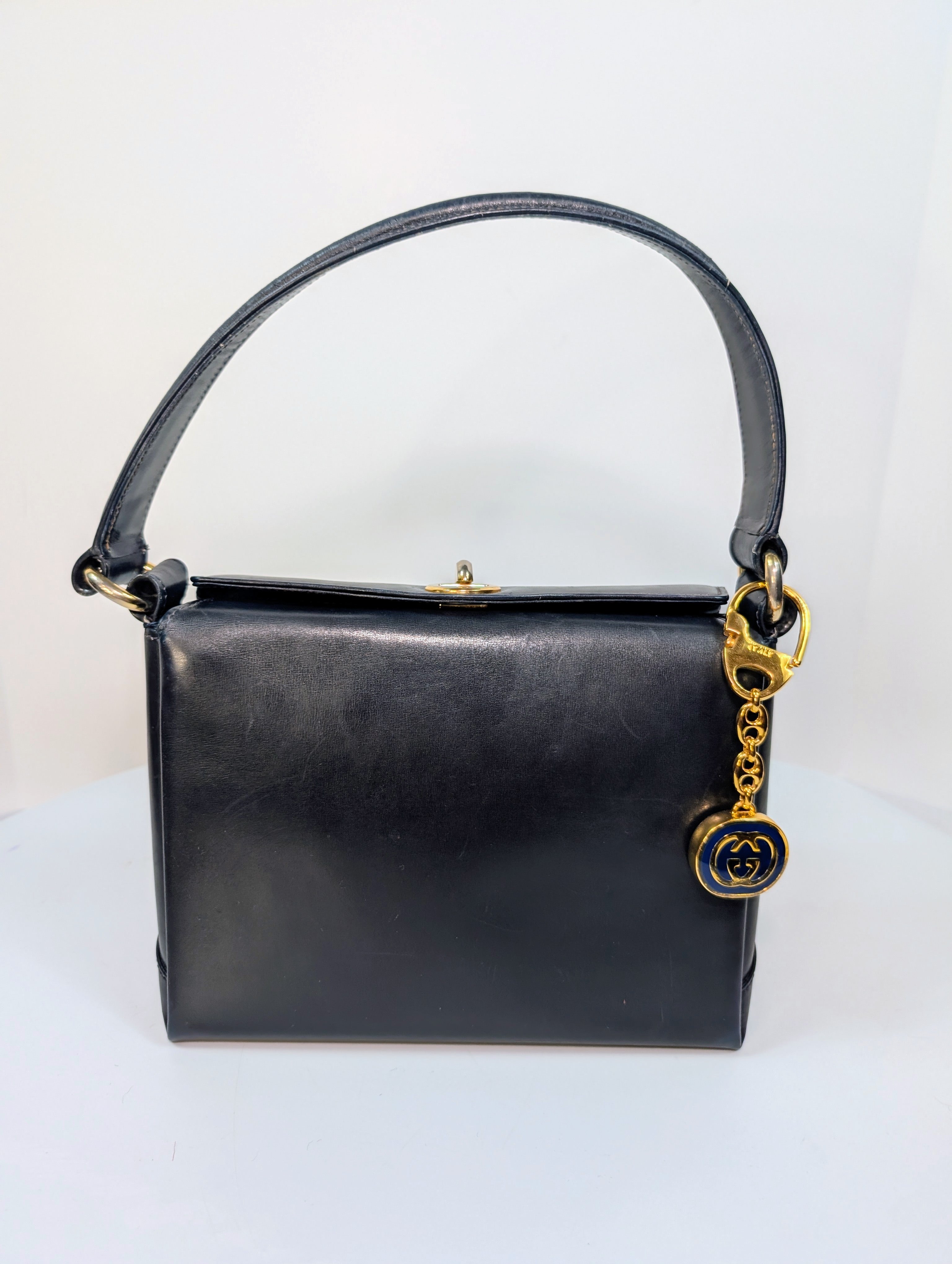 Gucci Vintage Gold Tone GG Logo Embossed Circle Bag Charm