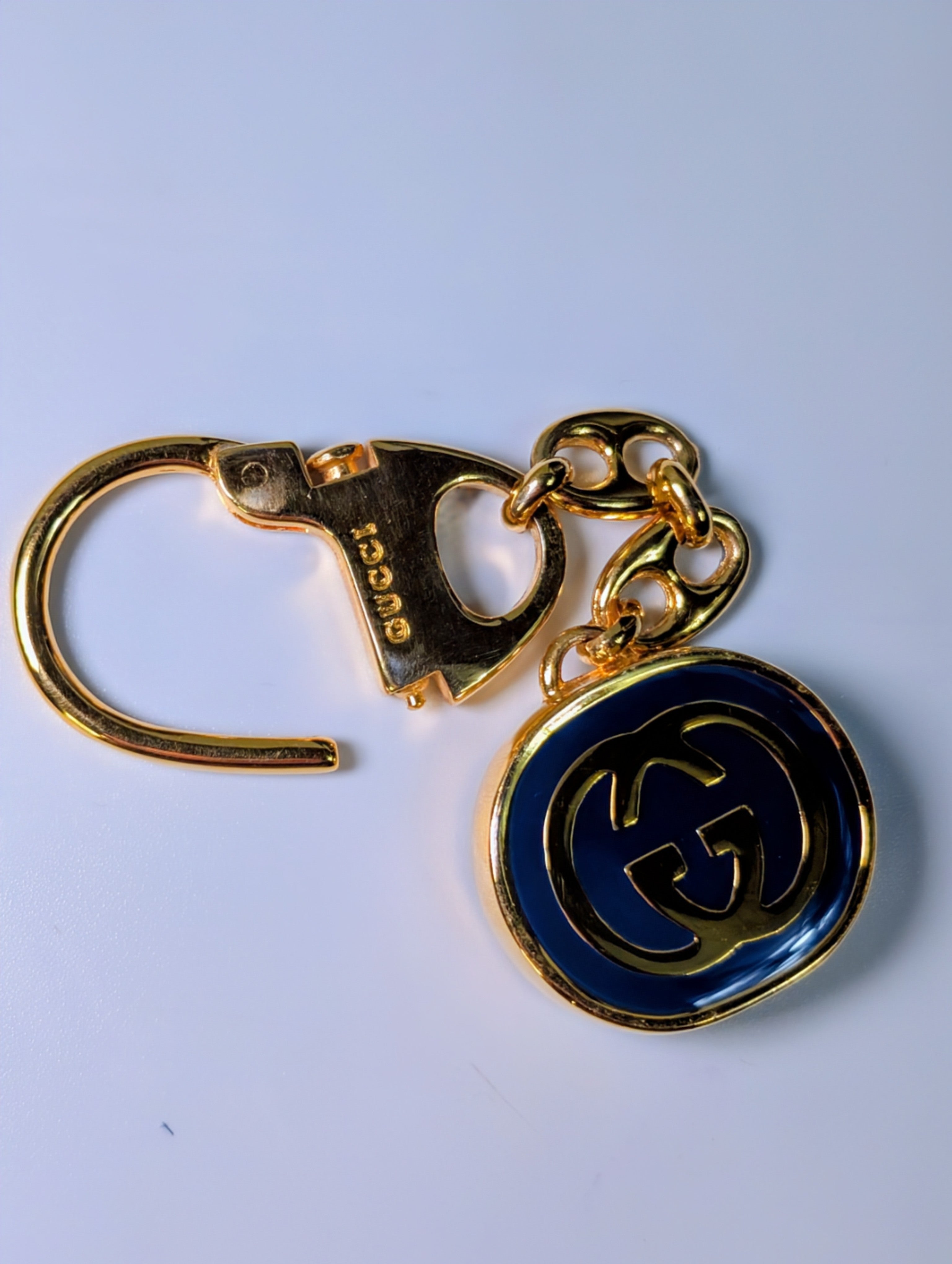 Gucci Vintage Gold Tone GG Logo Embossed Circle Bag Charm
