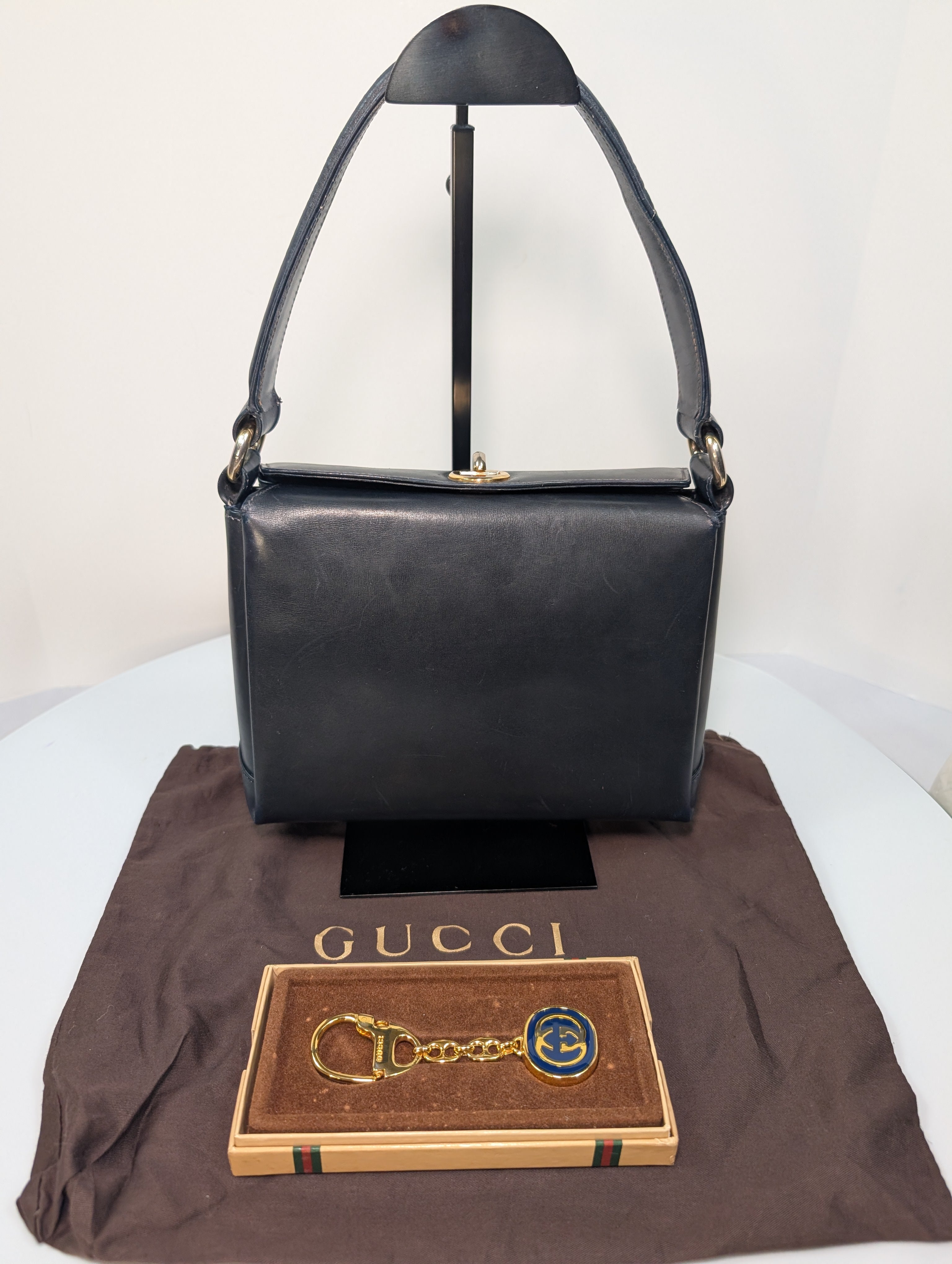 Gucci Vintage Gold Tone GG Logo Embossed Circle Bag Charm