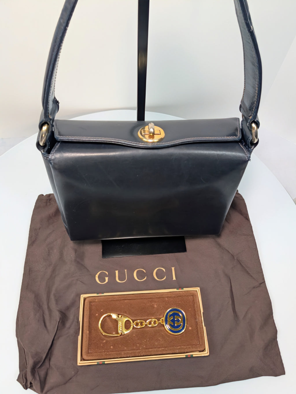 Gucci Vintage Gold Tone GG Logo Embossed Circle Bag Charm