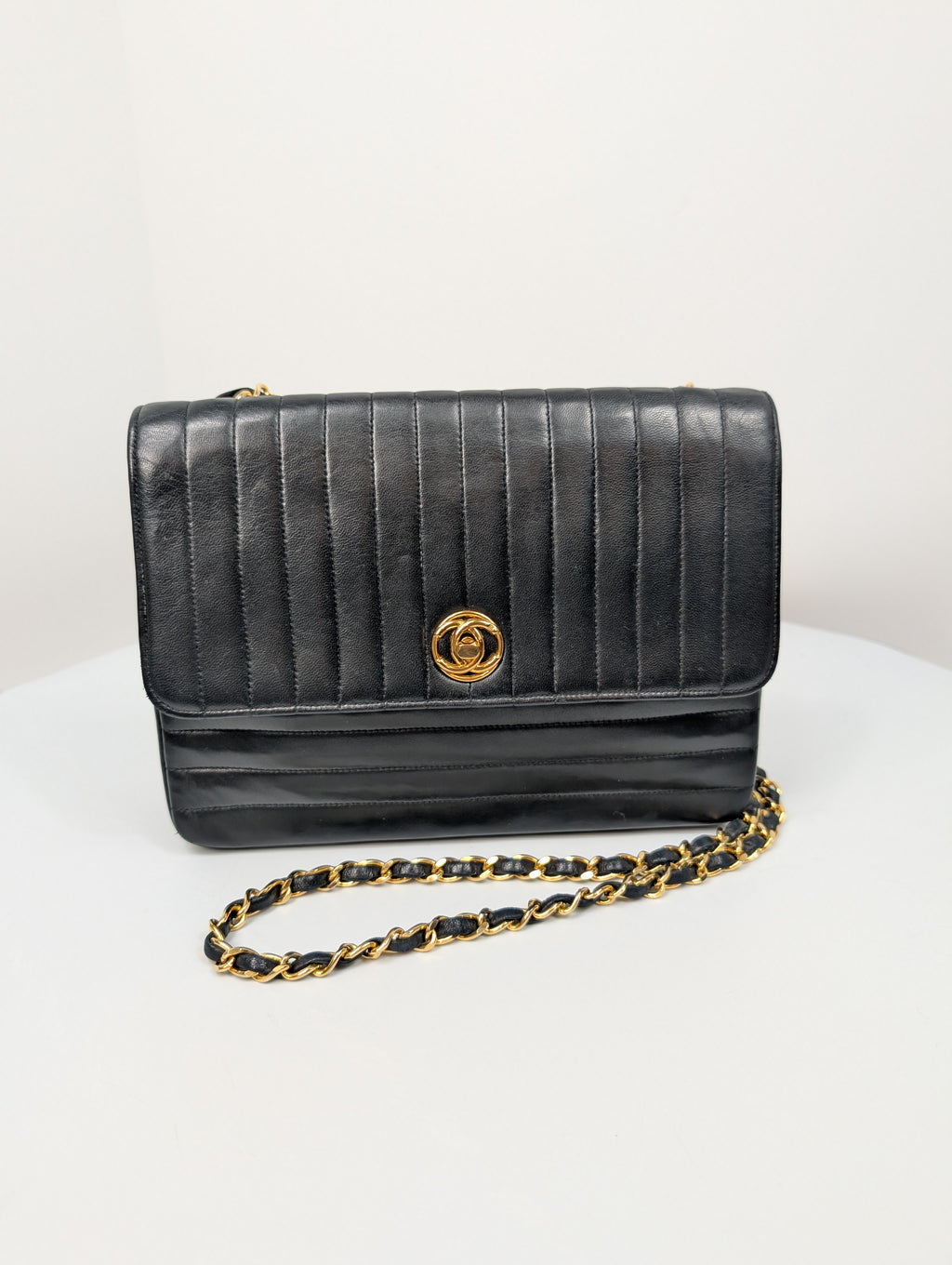 Chanel Vintage Black Vertical Stitch Flap Bag with Circle CC Turn-Lock and 24K Gold Plated Hardware