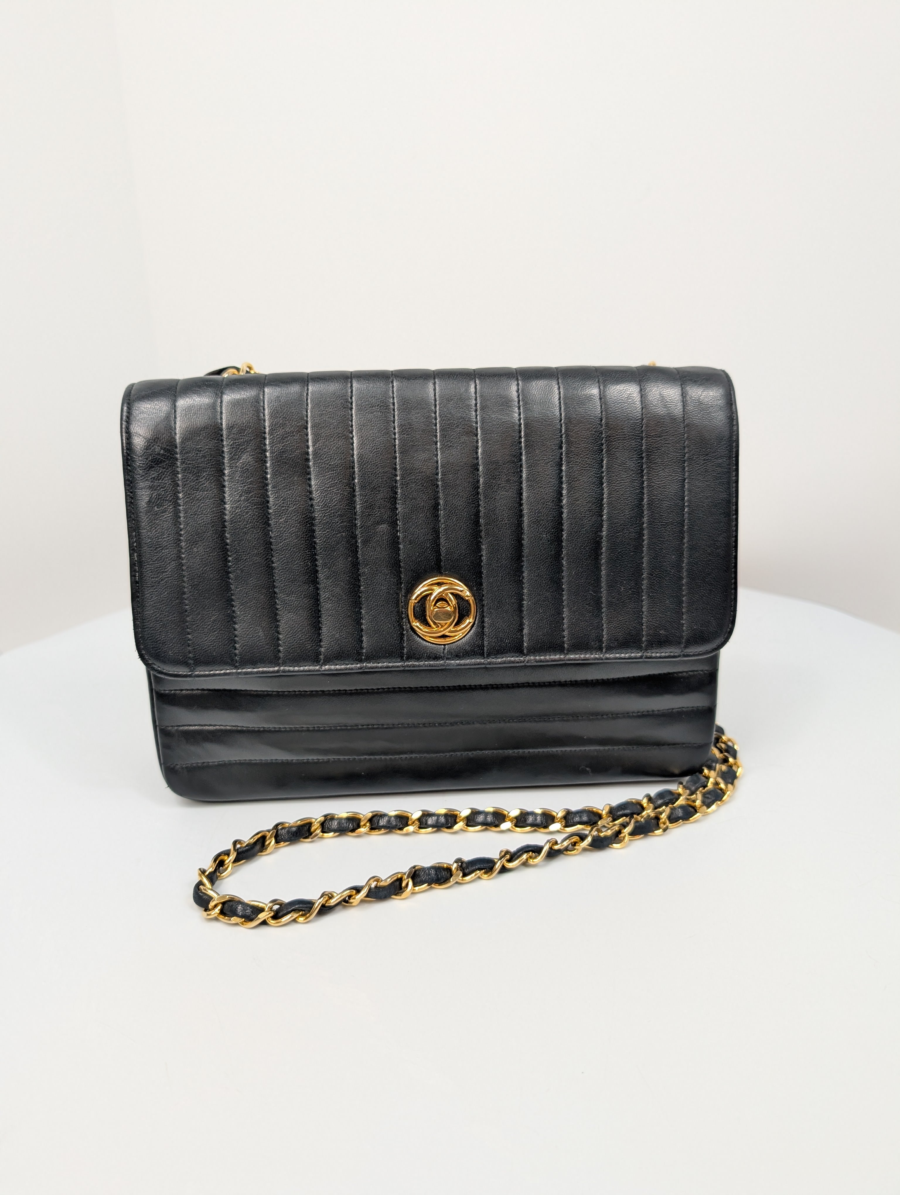 Chanel Vintage Black Vertical Stitch Flap Bag with Circle CC Turn-Lock and 24K Gold Plated Hardware