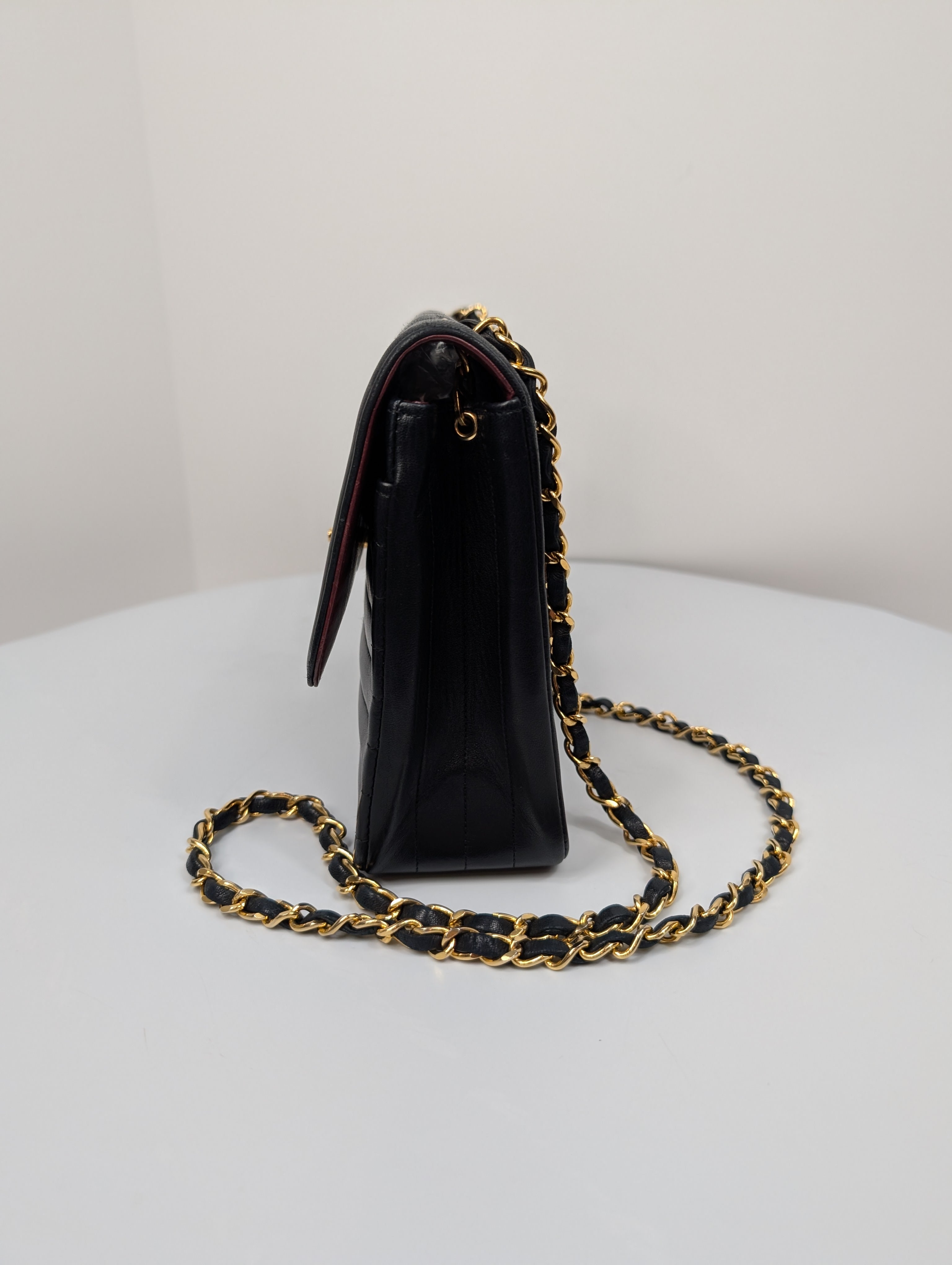 Chanel Vintage Black Vertical Stitch Flap Bag with Circle CC Turn-Lock and 24K Gold Plated Hardware