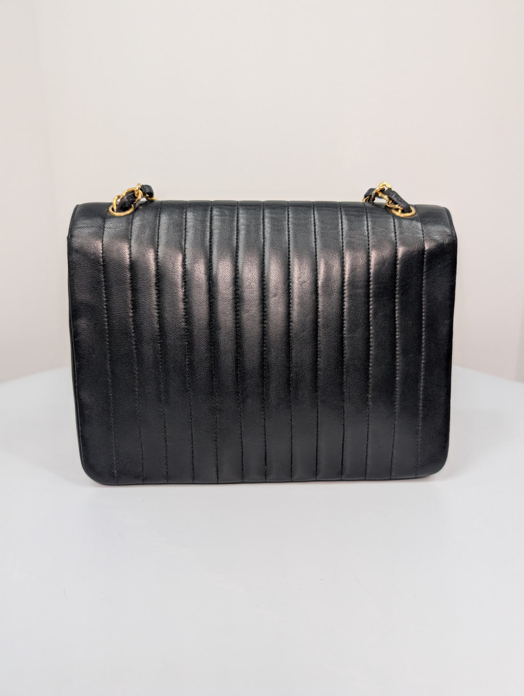 Chanel Vintage Black Vertical Stitch Flap Bag with Circle CC Turn-Lock and 24K Gold Plated Hardware