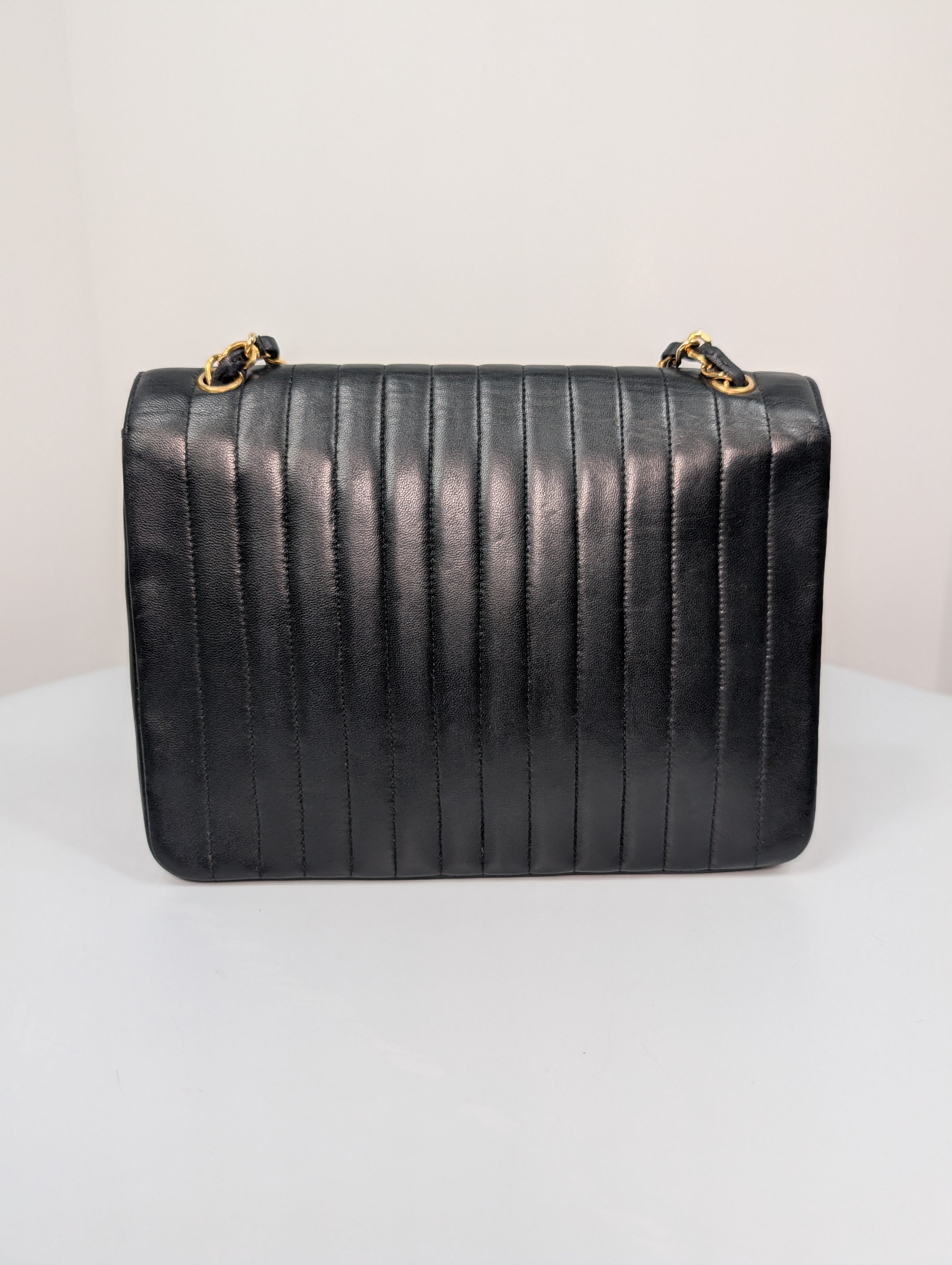 Chanel Vintage Black Vertical Stitch Flap Bag with Circle CC Turn-Lock and 24K Gold Plated Hardware