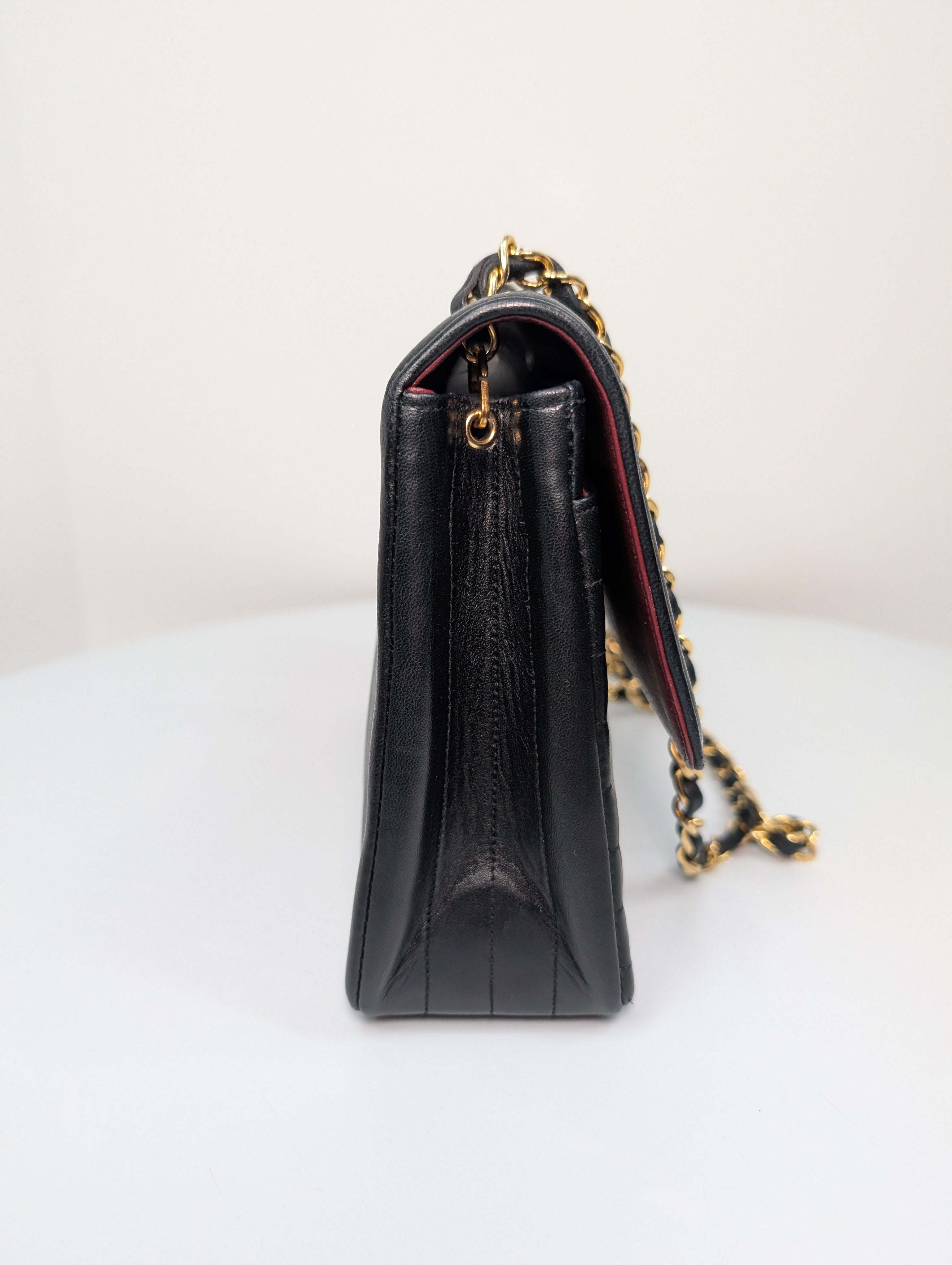 Chanel Vintage Black Vertical Stitch Flap Bag with Circle CC Turn-Lock and 24K Gold Plated Hardware