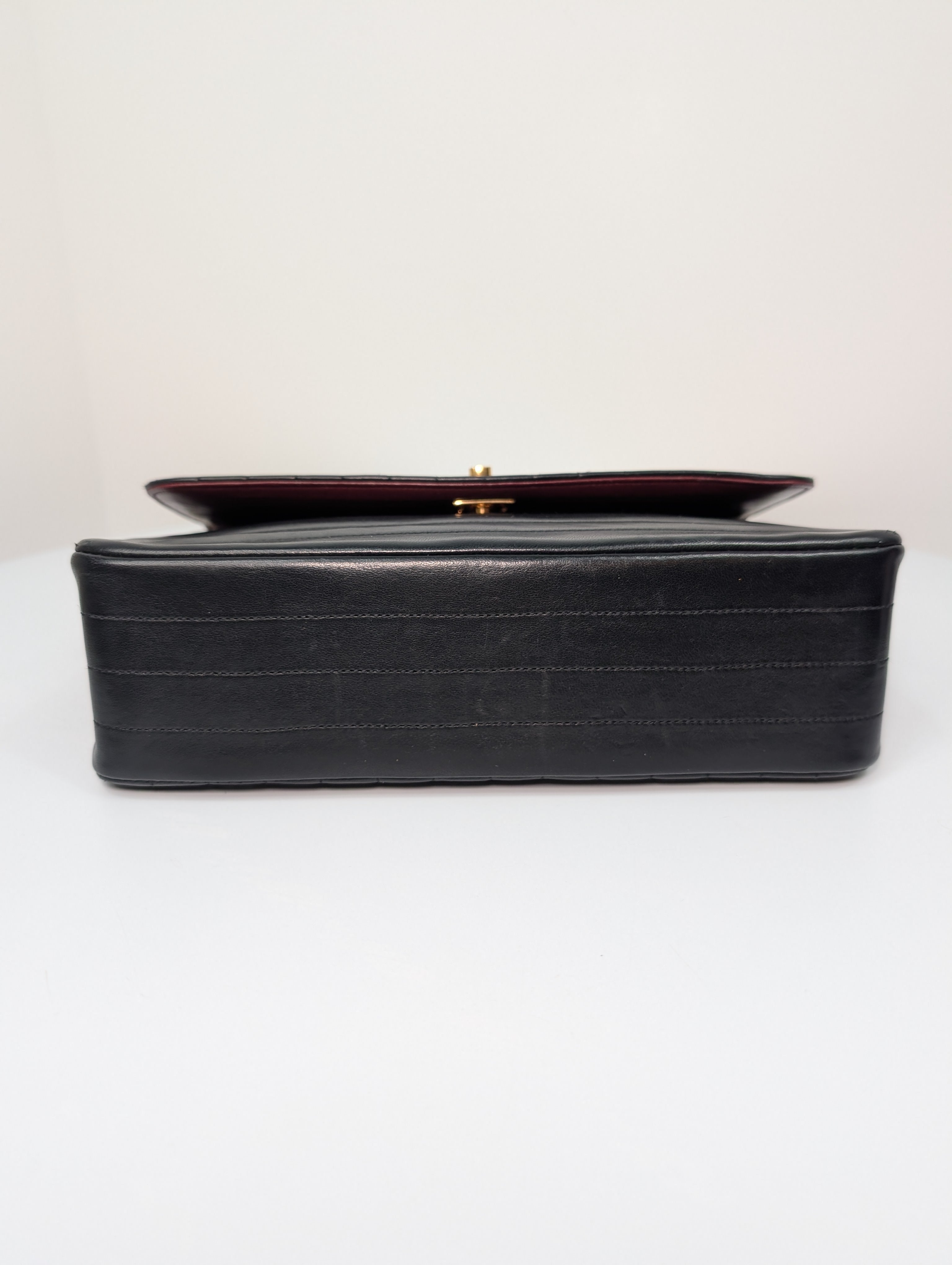 Chanel Vintage Black Vertical Stitch Flap Bag with Circle CC Turn-Lock and 24K Gold Plated Hardware