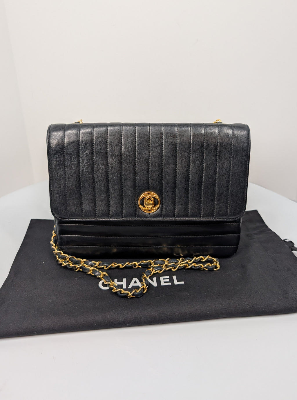 Chanel Vintage Black Vertical Stitch Flap Bag with Circle CC Turn-Lock and 24K Gold Plated Hardware