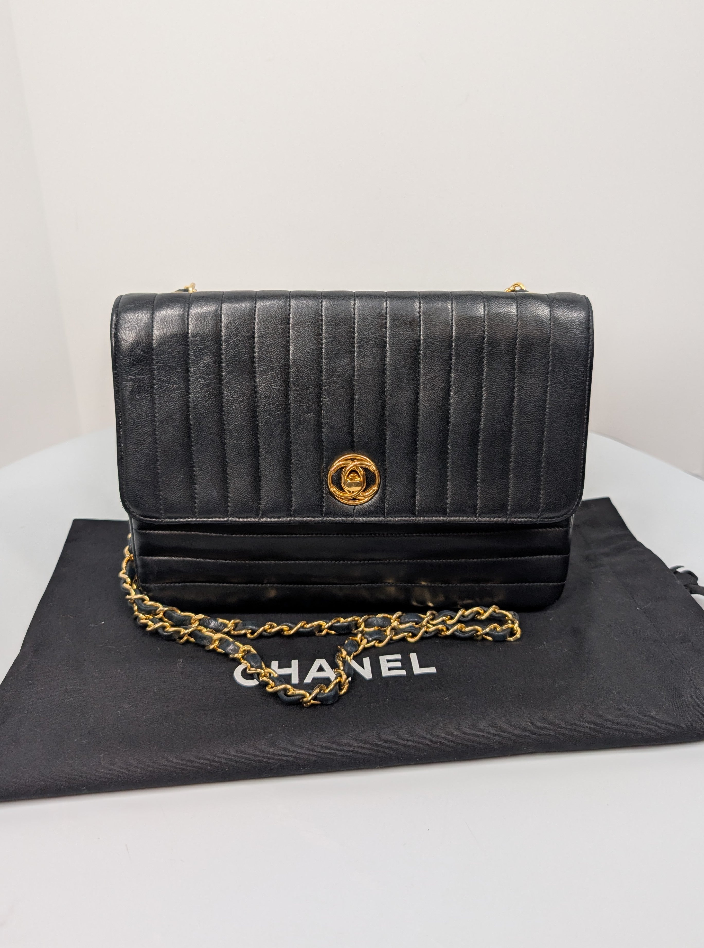 Chanel Vintage Black Vertical Stitch Flap Bag with Circle CC Turn-Lock and 24K Gold Plated Hardware
