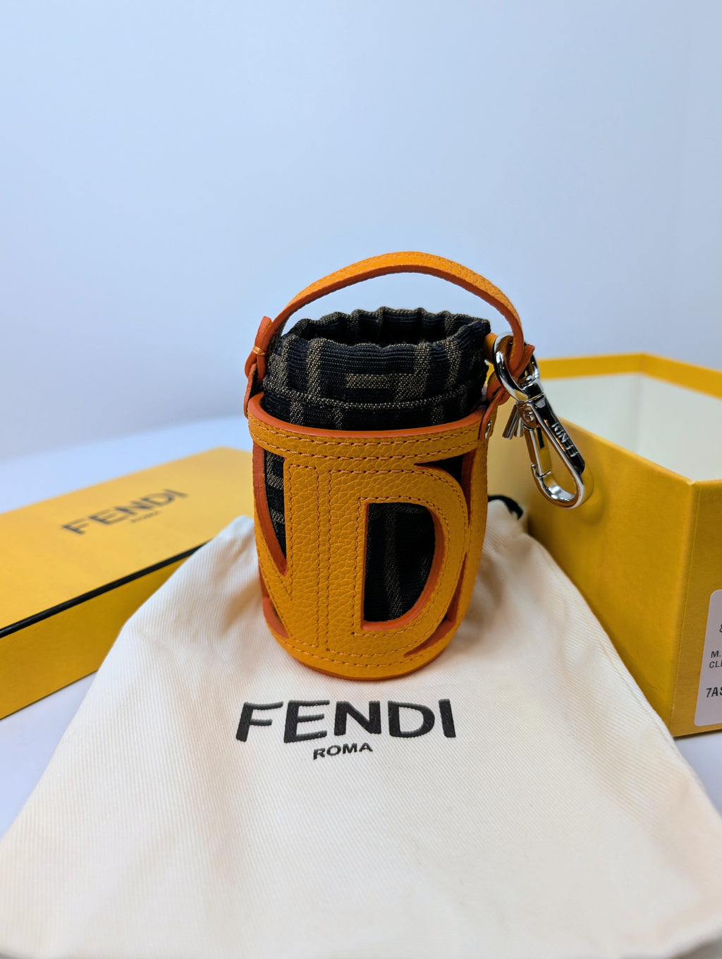 Fendi Clementine Orange Leather “FENDI” Cutout Mon Tresor Mink, Fox and Goat Fur Bag Charm