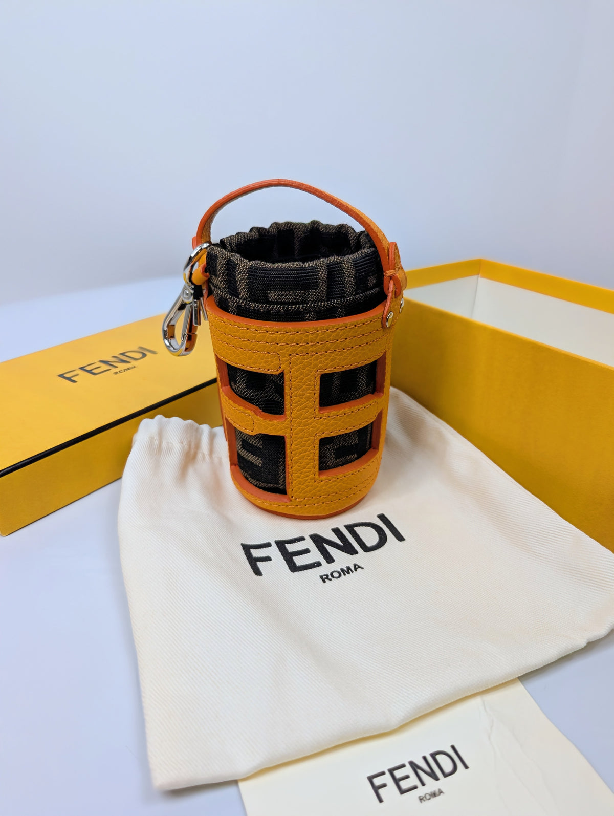 Fendi Clementine Orange Leather “FENDI” Cutout Mon Tresor Mink, Fox and Goat Fur Bag Charm
