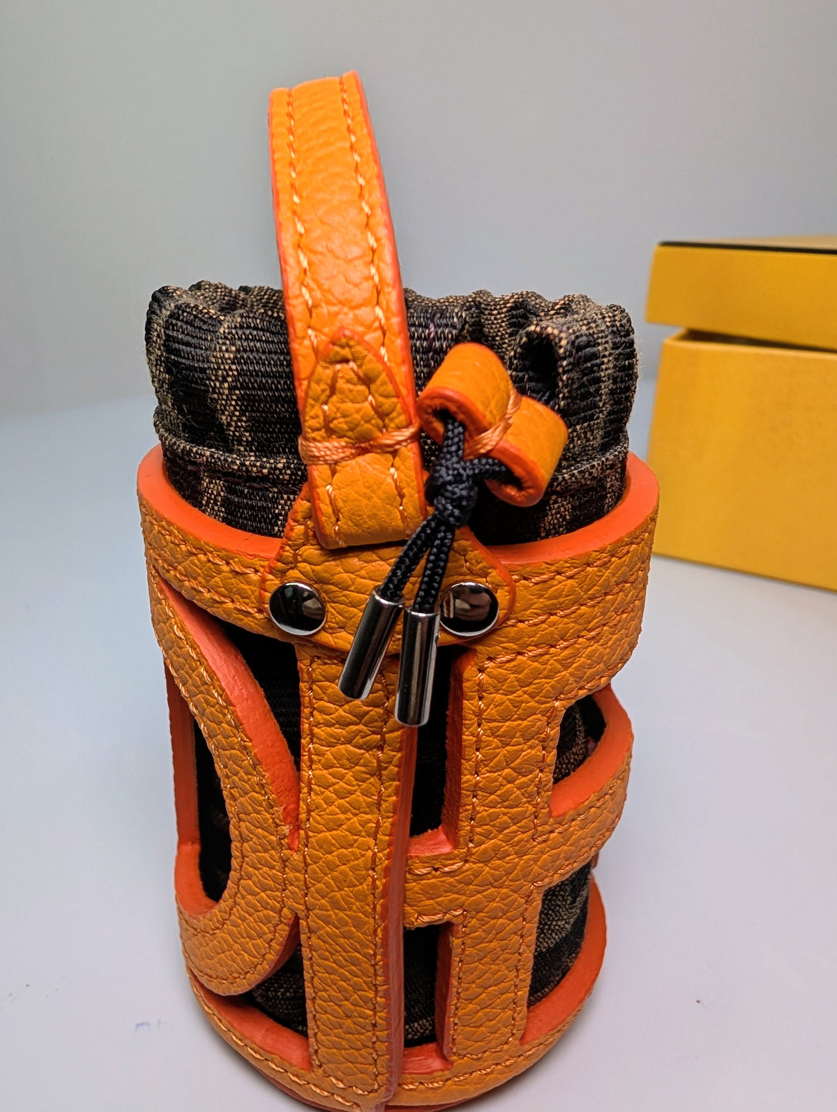 Fendi Clementine Orange Leather “FENDI” Cutout Mon Tresor Mink, Fox and Goat Fur Bag Charm